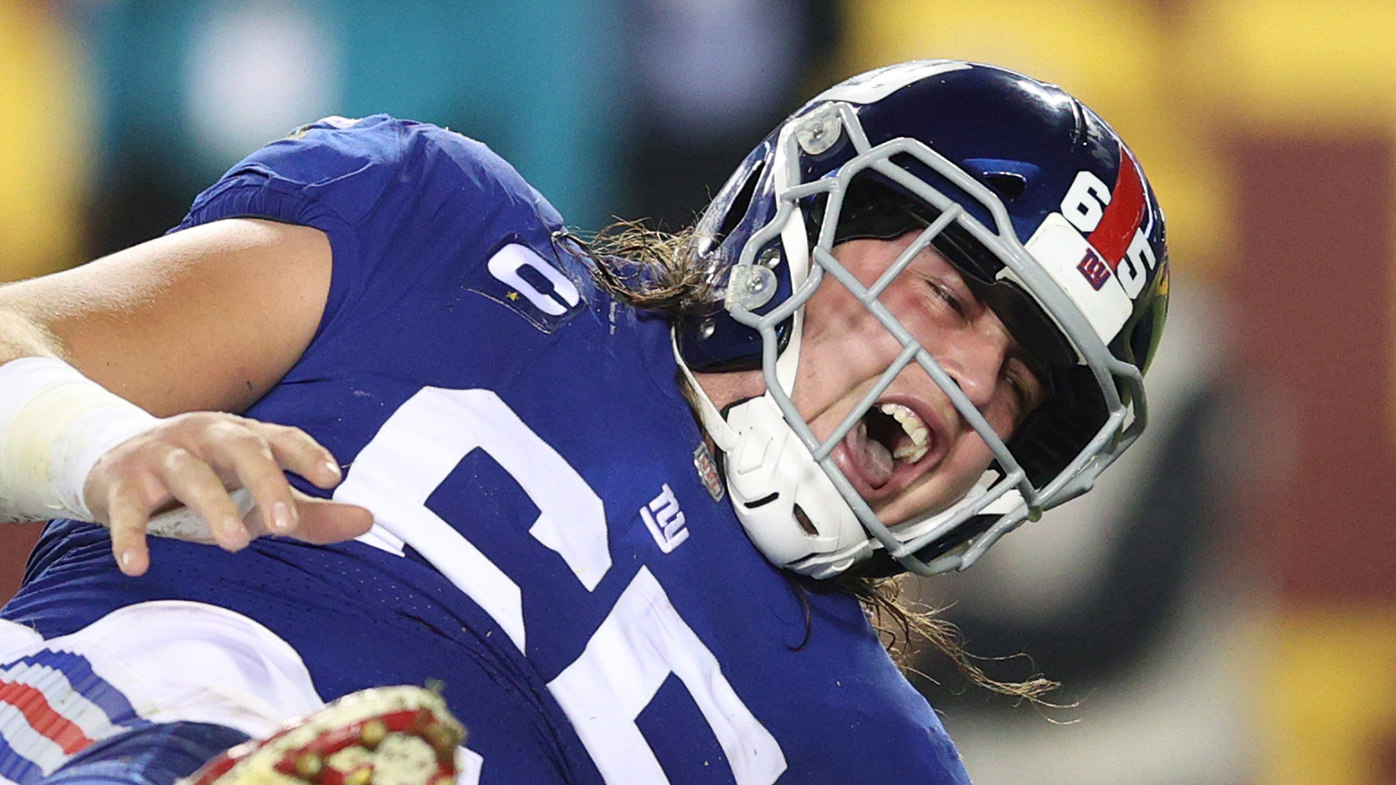 Nick Gates reacts after suffering a broken leg for New York against Washington.