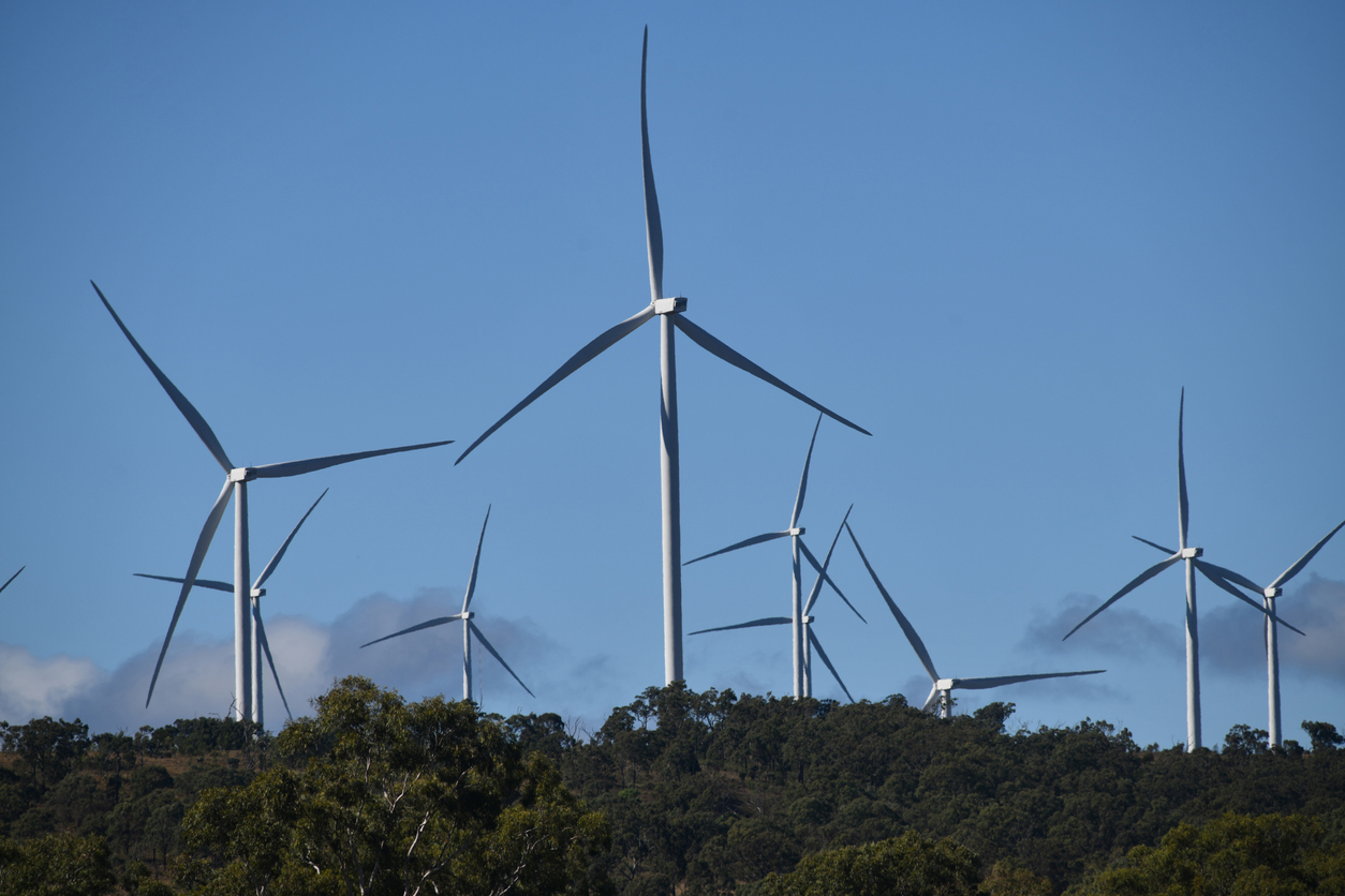 Wind turbines at the Coopers Gap Wind Farm, a 453 megawatt wind farm in the Western Downs and South Burnett regions of Queensland, Australia. The wind farm has 123 turbines about 180 metres (591 ft) in height from the tower base to the tip of the blade.