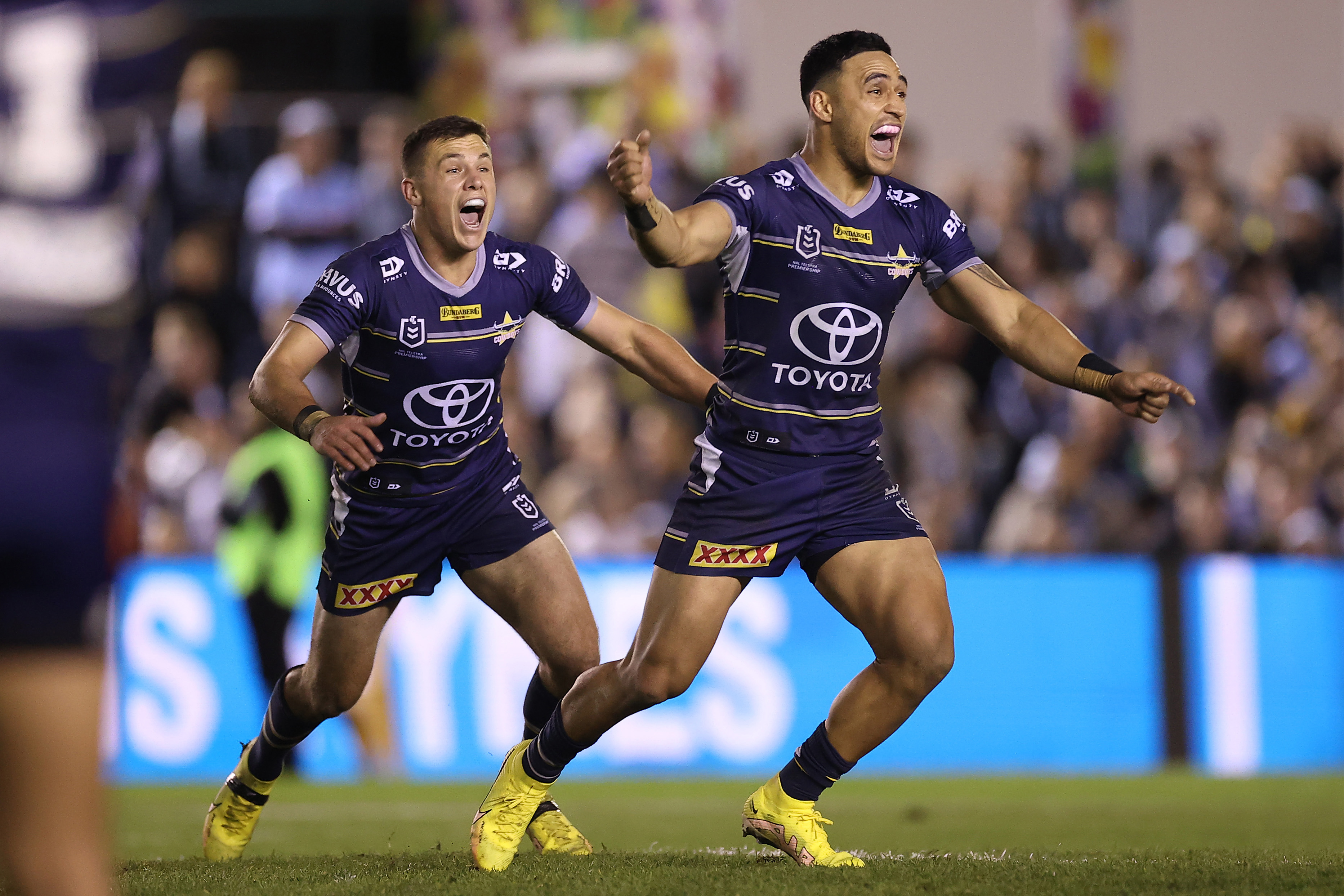 Valentine Holmes of the Cowboys celebrates kicking the winning field goal in golden-point against the Sharks.