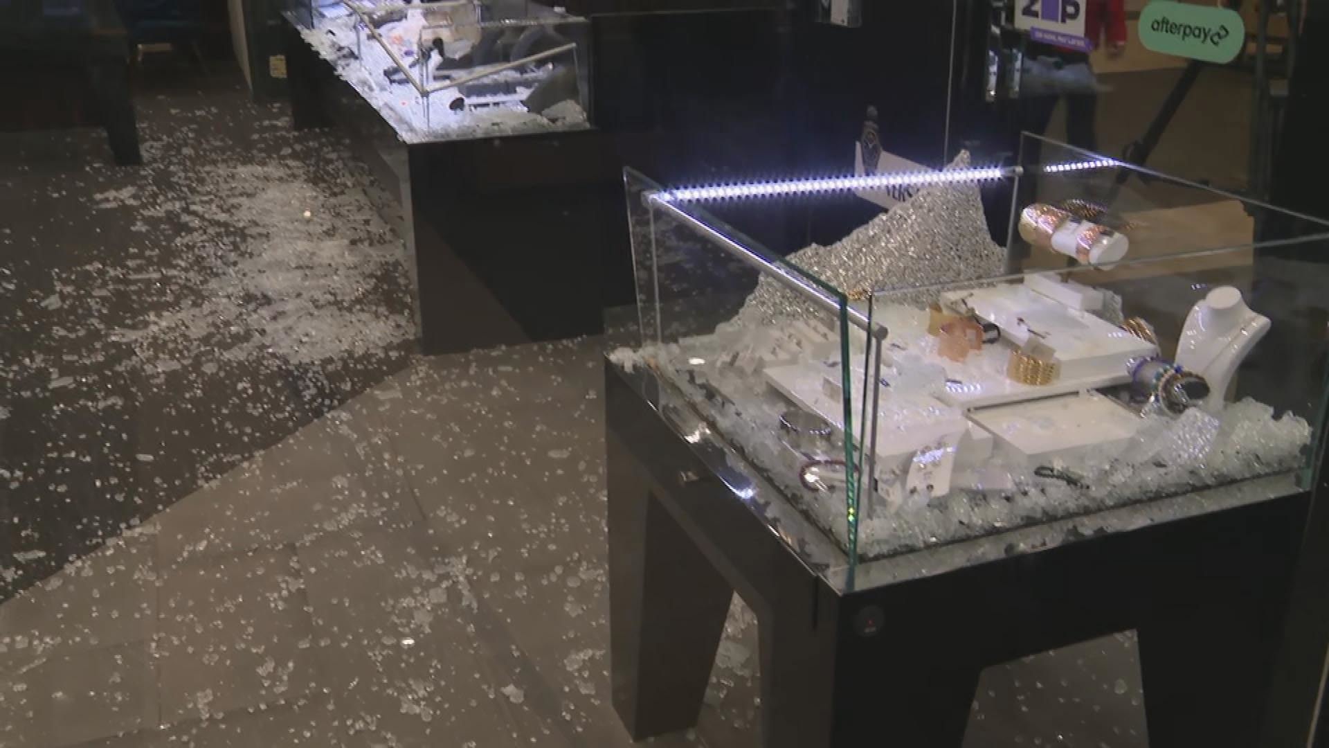 Jewellery shop workers in Melbourne have taken on armed robbers who targeted their store