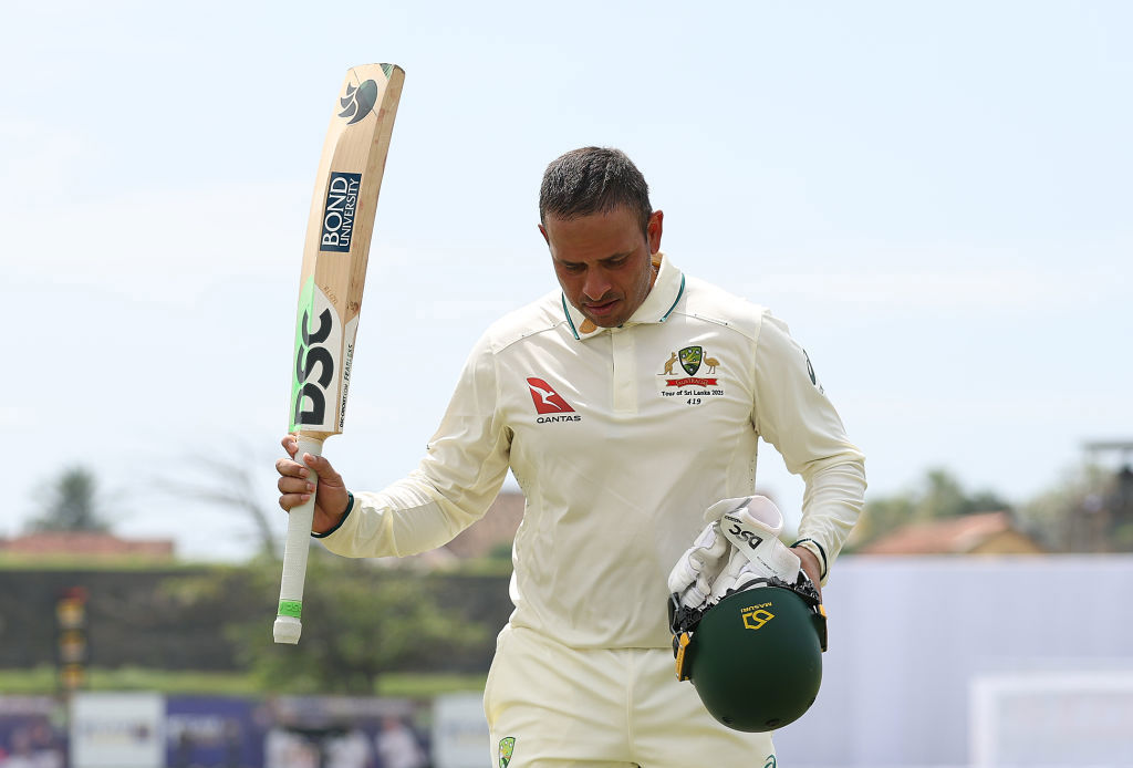Usman Khawaja acknowledges the crowd as he walks off.