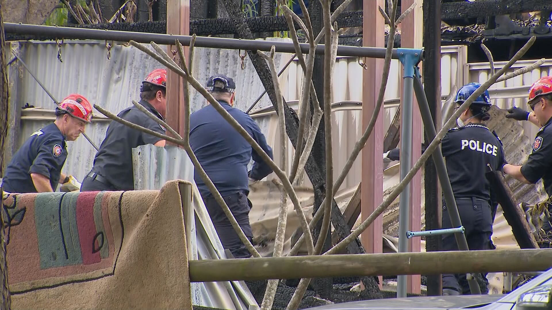 Dozens of detectives are on Russell Island, south-east of Brisbaneuncover what caused a fire that killed a father and five boys.Police have confirmed "some elements" of the house fire that killed the children and their 34-year-old father require "closer scrutiny".