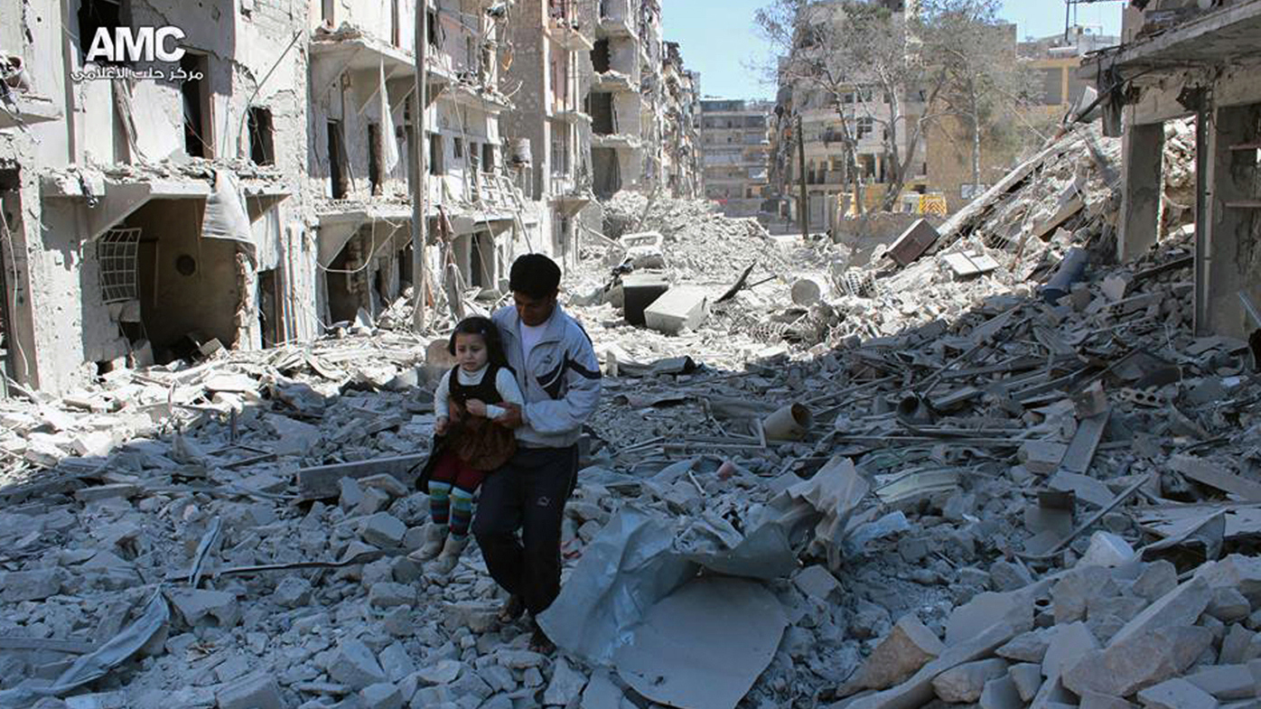 A photo provided by the anti-government activist group Aleppo Media Centre (AMC) shows the damage from government airstrikes in Aleppo, Syria.