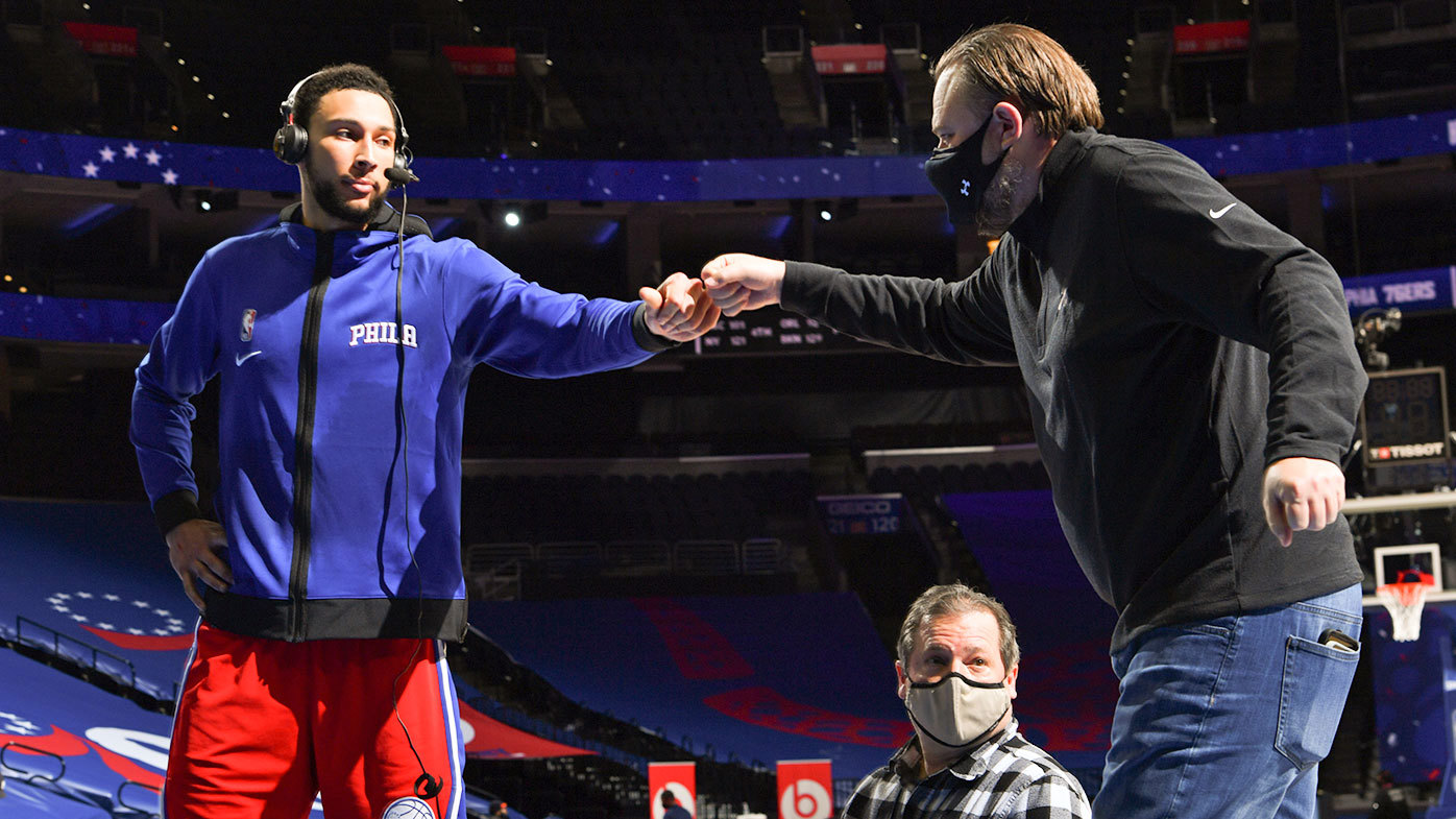 Ben Simmons and President of Basketball Operations Daryl Morey embrace during a February 2021 game