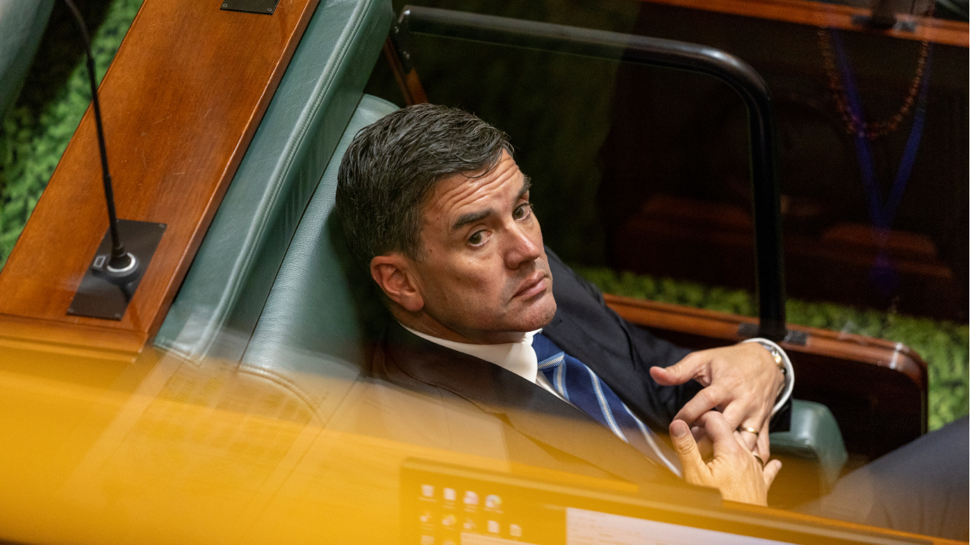 Brad Battin sitting in Victorian parliament.