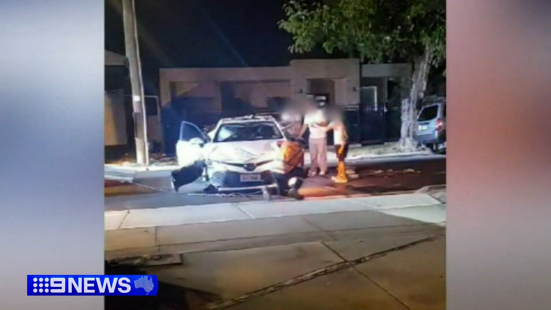 A taxi has crashed into parked cars and flipped onto its roof in Adelaide