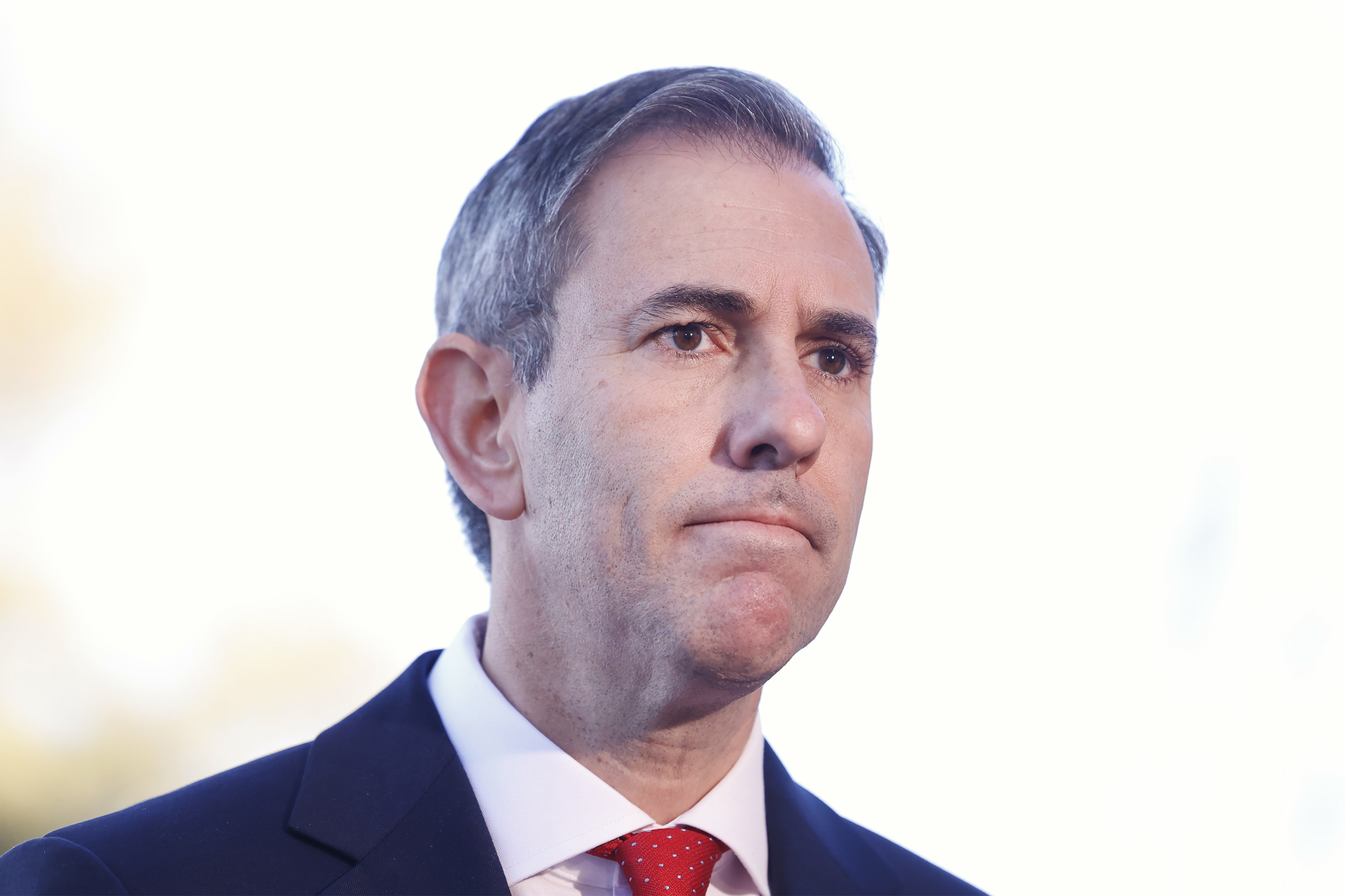 Treasurer Jim Chalmers speaks with the media on arrival to Australian Parliament House ahead of handing down the 2026 budget on May 12, 2026 in Canberra, Australia.