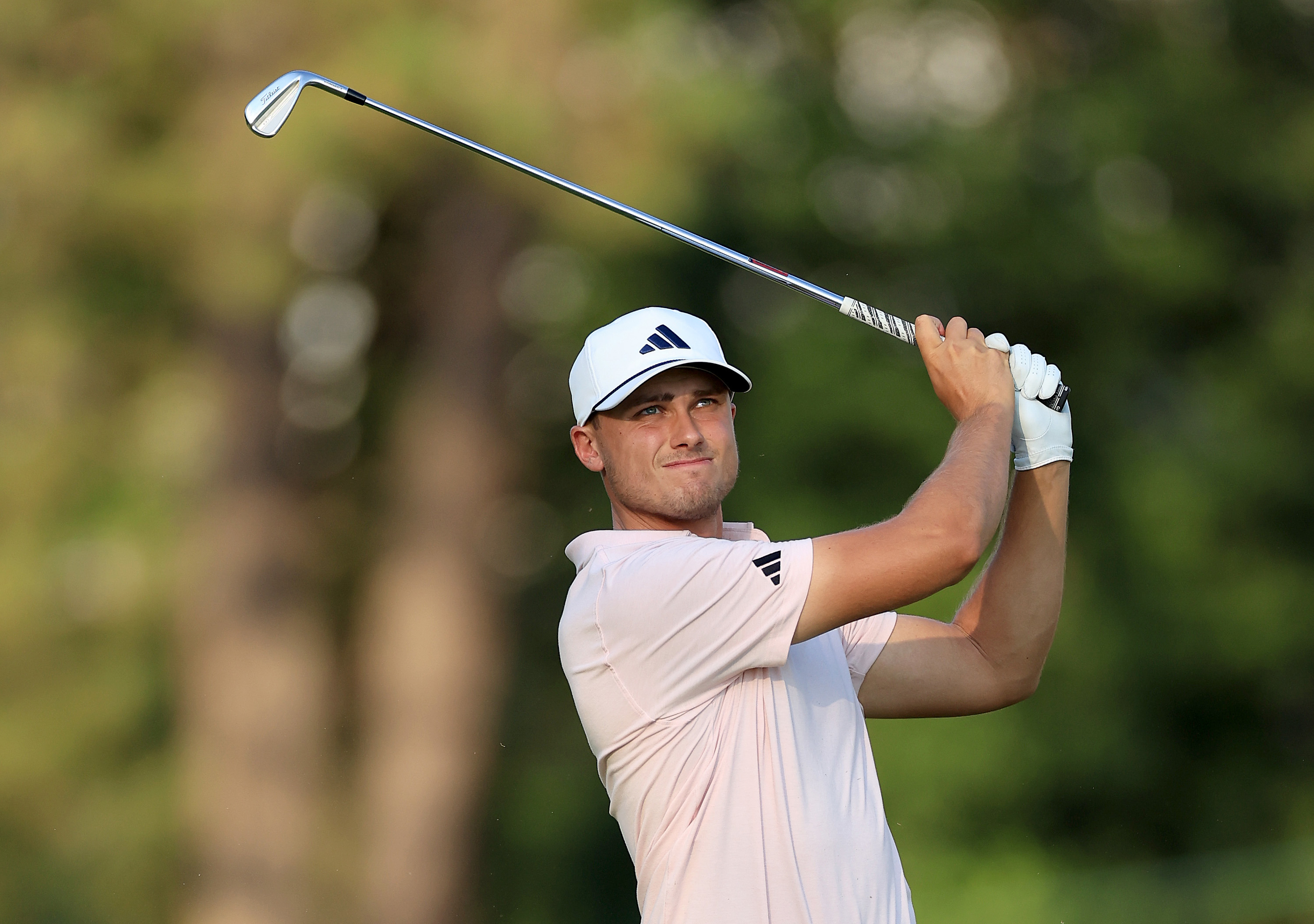 Ludvig Aberg of Sweden plays his second shot on the 18th hole.