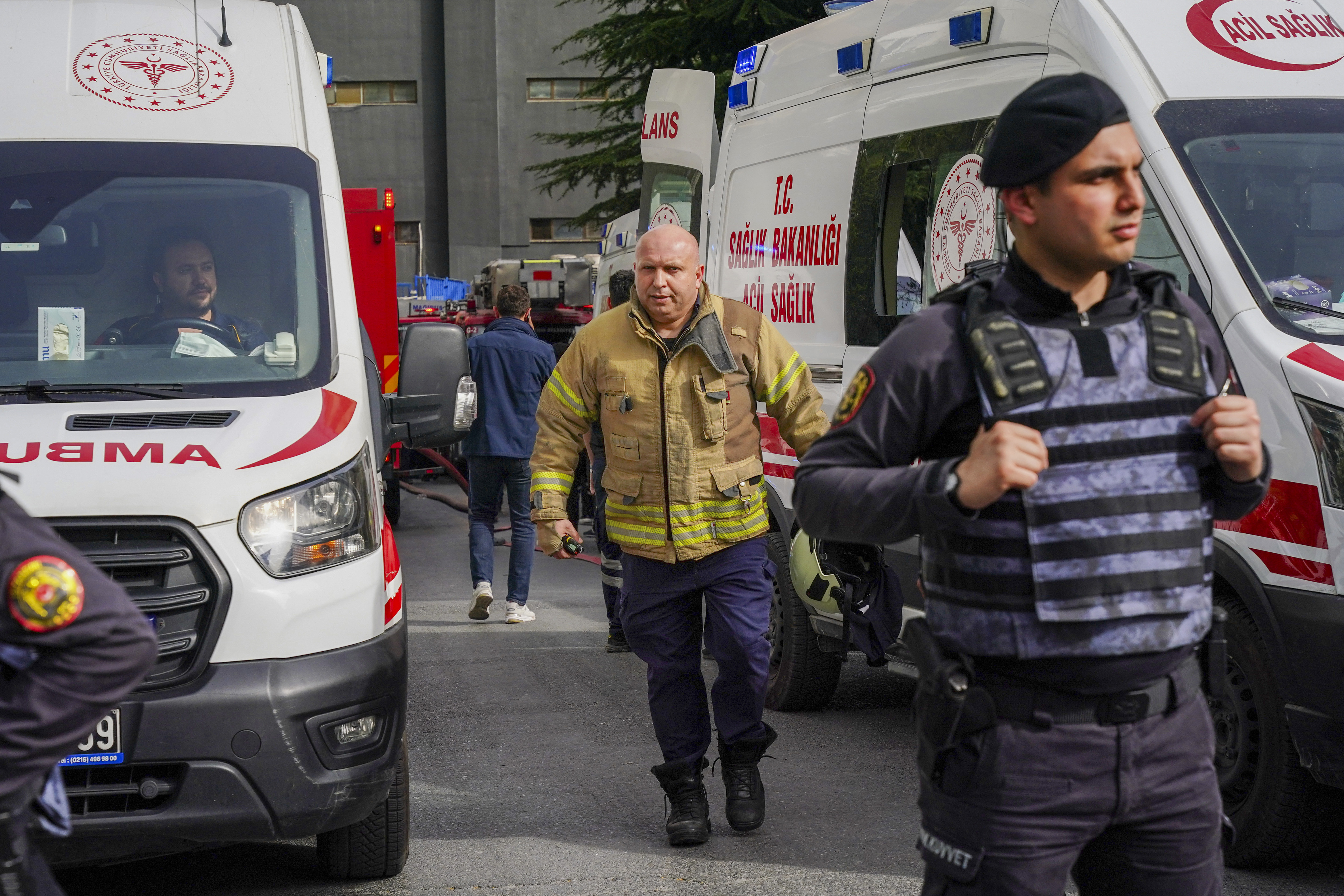 Firefighters and medical teams work after a fire broke out in a nightclub in Istanbul, Turkey, Tuesday, April 2, 2024. 