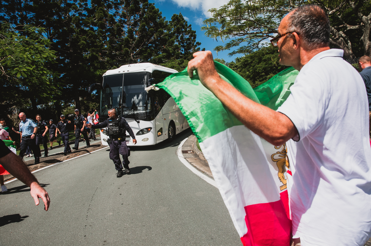 Police attempted to move the group on before the bus eventually travelled to the airport with a police escort.﻿