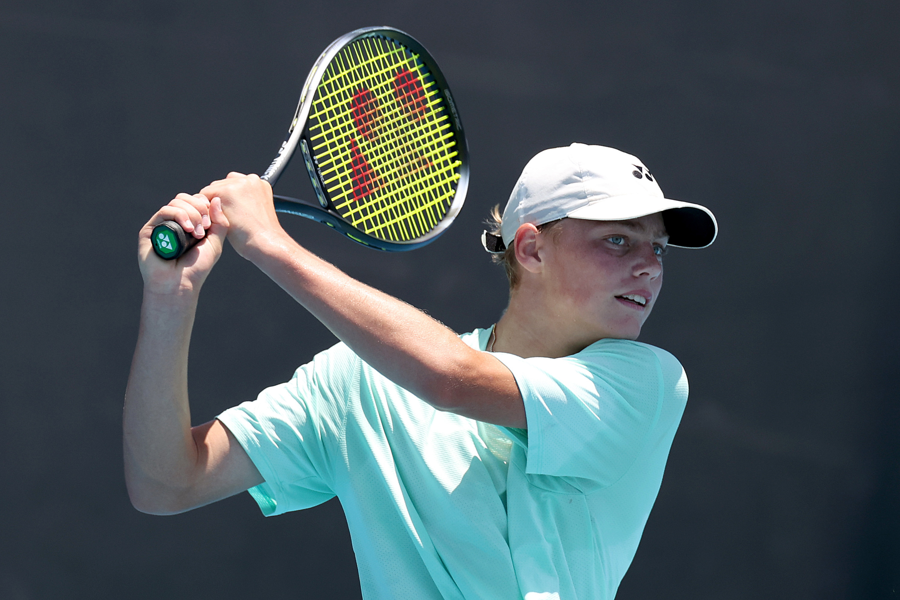 ruz Hewitt play doubles during a training session with Alex de Minaur