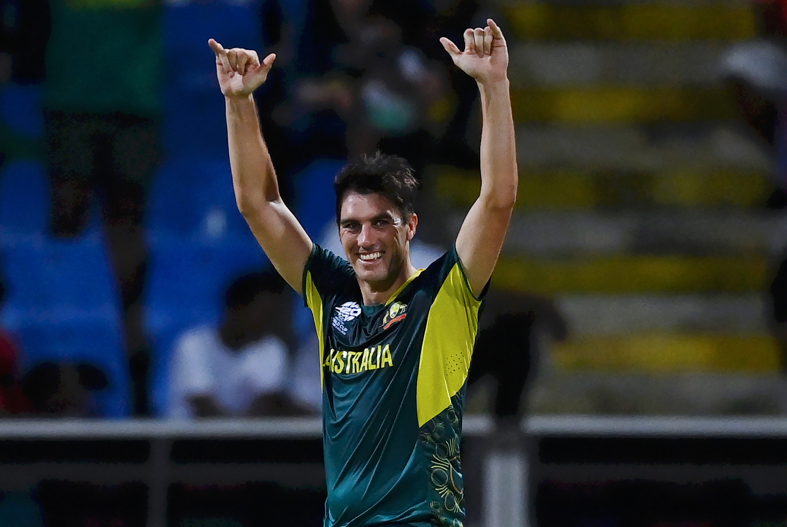 Pat Cummins of Australia celebrates after dismissing Taskin Ahmed of Bangladesh (not pictured) for his hat trick during the ICC Men's T20 Cricket World Cup West Indies & USA 2024 Super Eight match between Australia and Bangladesh at Sir Vivian Richards Stadium on June 20, 2024 in Antigua, Antigua and Barbuda. (Photo by Gareth Copley/Getty Images)