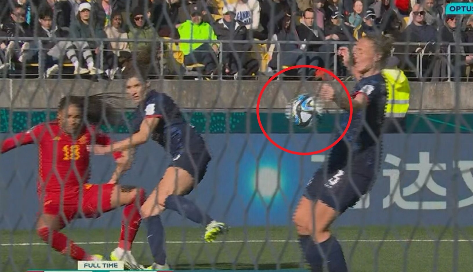 Netherlands player Stefanie van der Gragt handballs inside the penalty area.