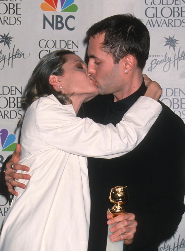 Sibling actors Angelina Jolie and James Haven kiss as they attend the 57th annual Golden Globe Awards at the Beverly Hilton Hotel, Beverly Hills, California, January 24, 2000