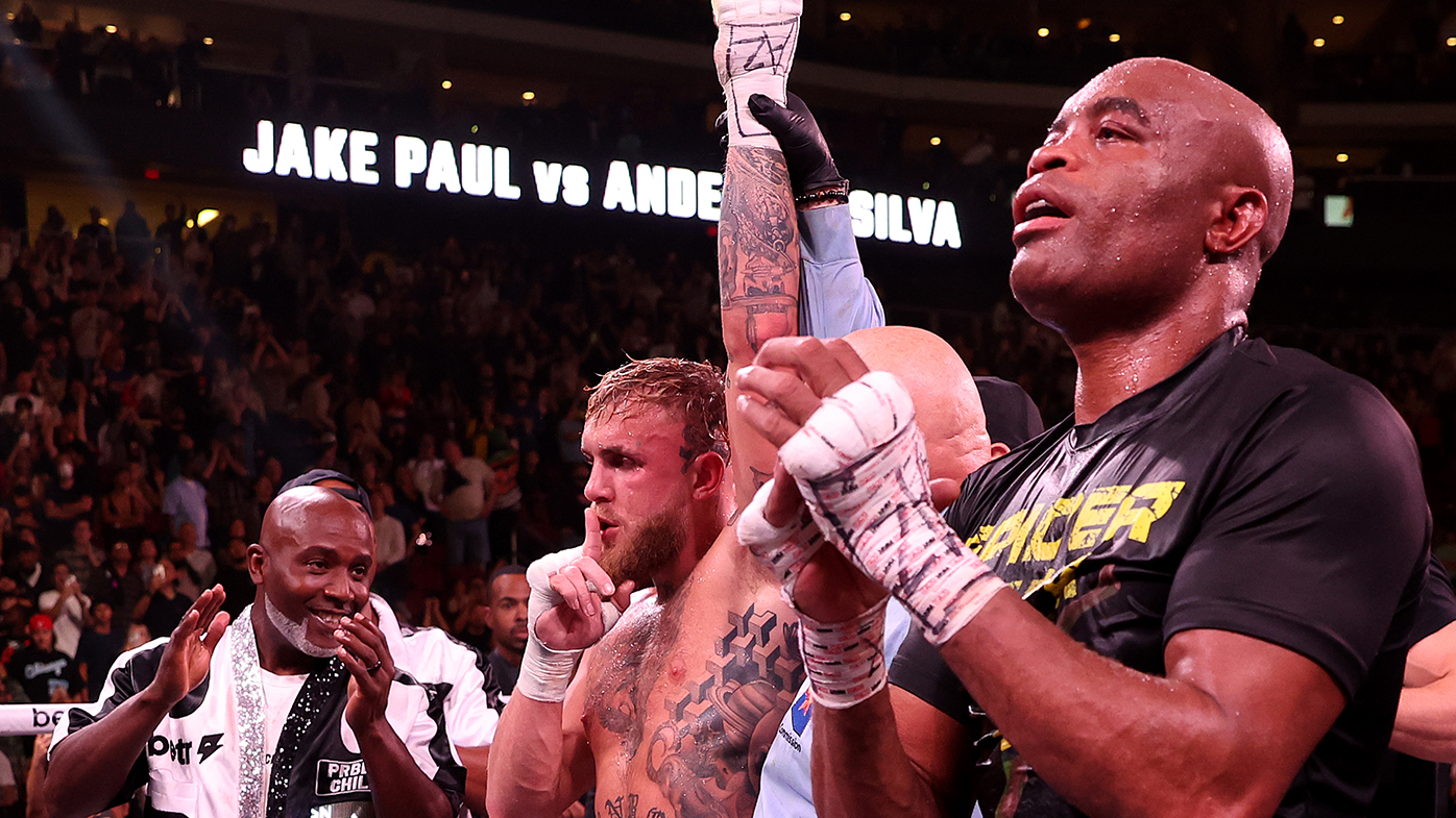 Jake Paul celebrates with his team after his unanimous decision win over Anderson Silva.