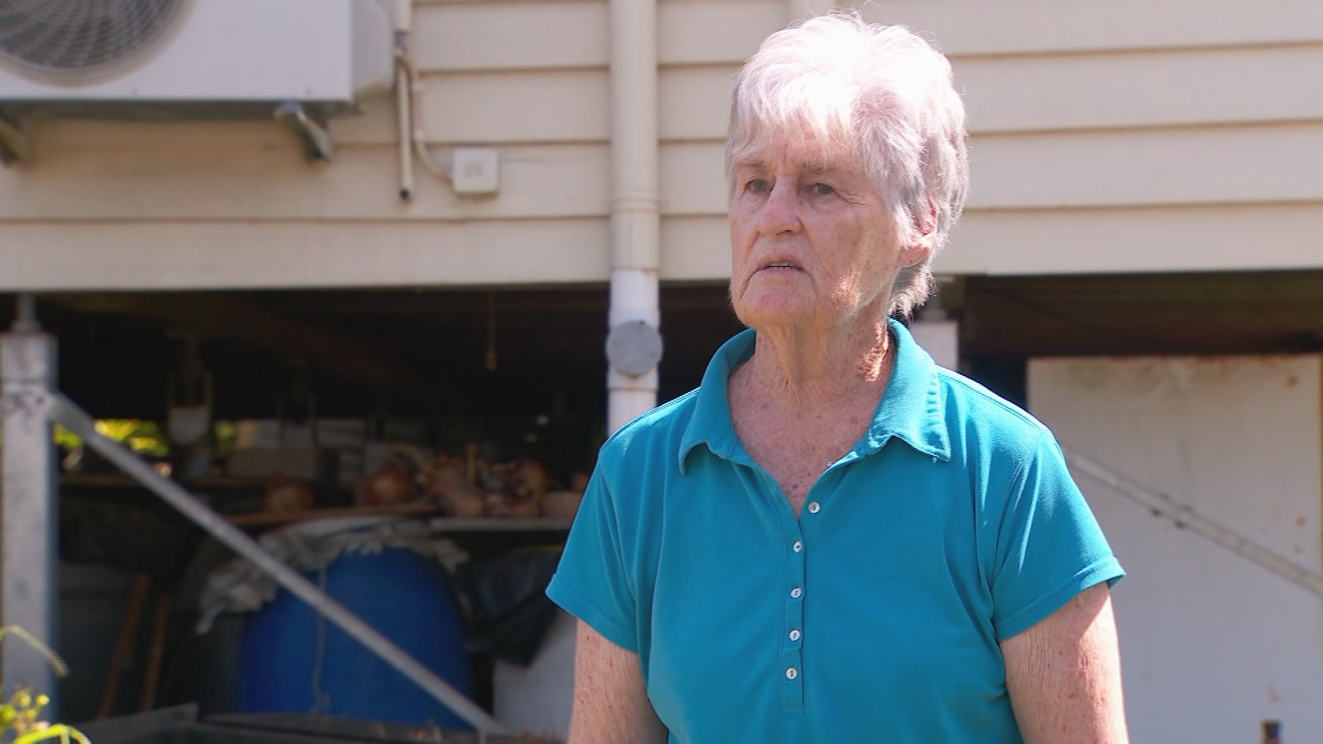 Michele Cauchi, mother of Joel Cauchi, speaks from outside their Toowoomba family home. 