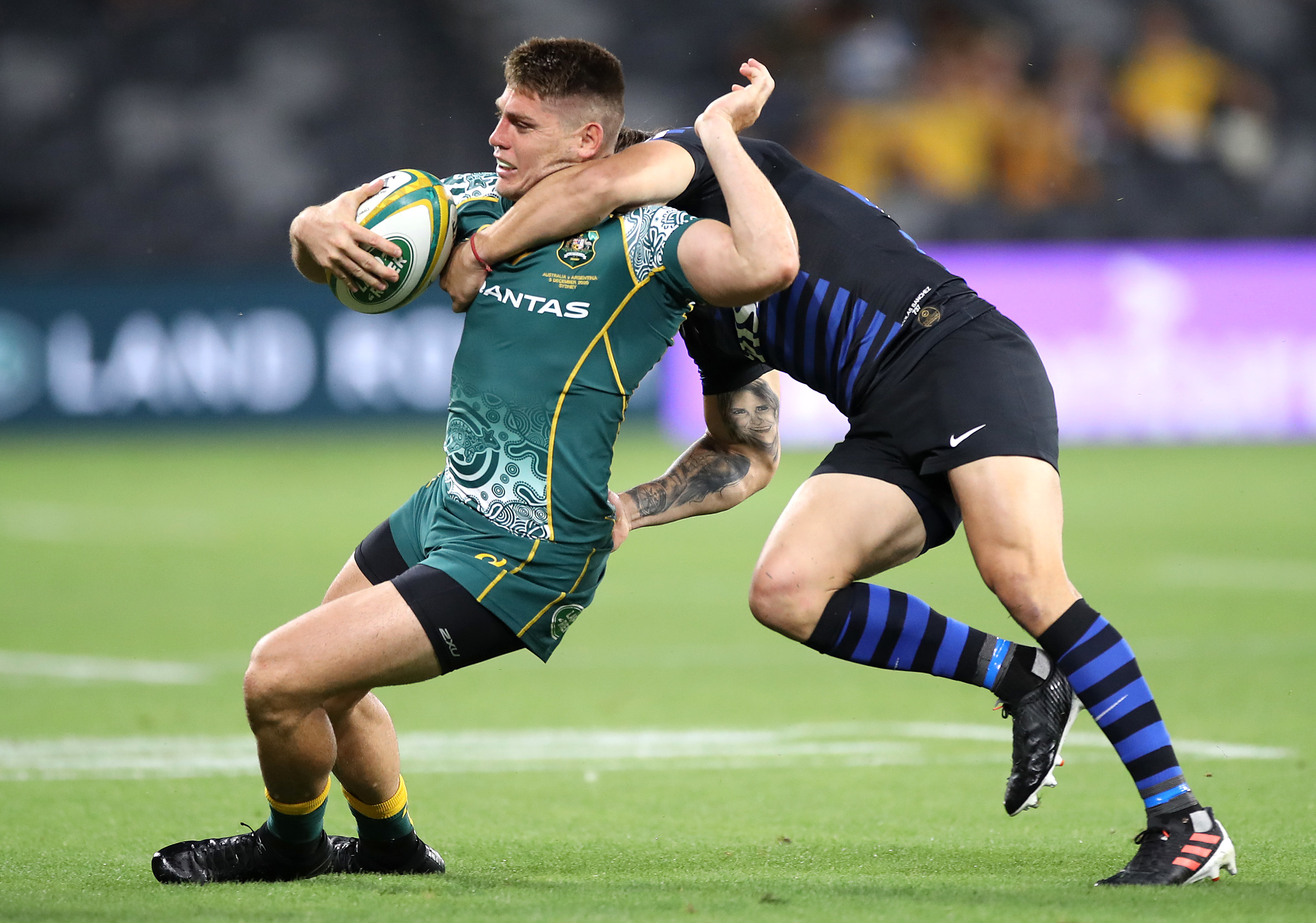 James O'Connor of the Wallabies is tackled.