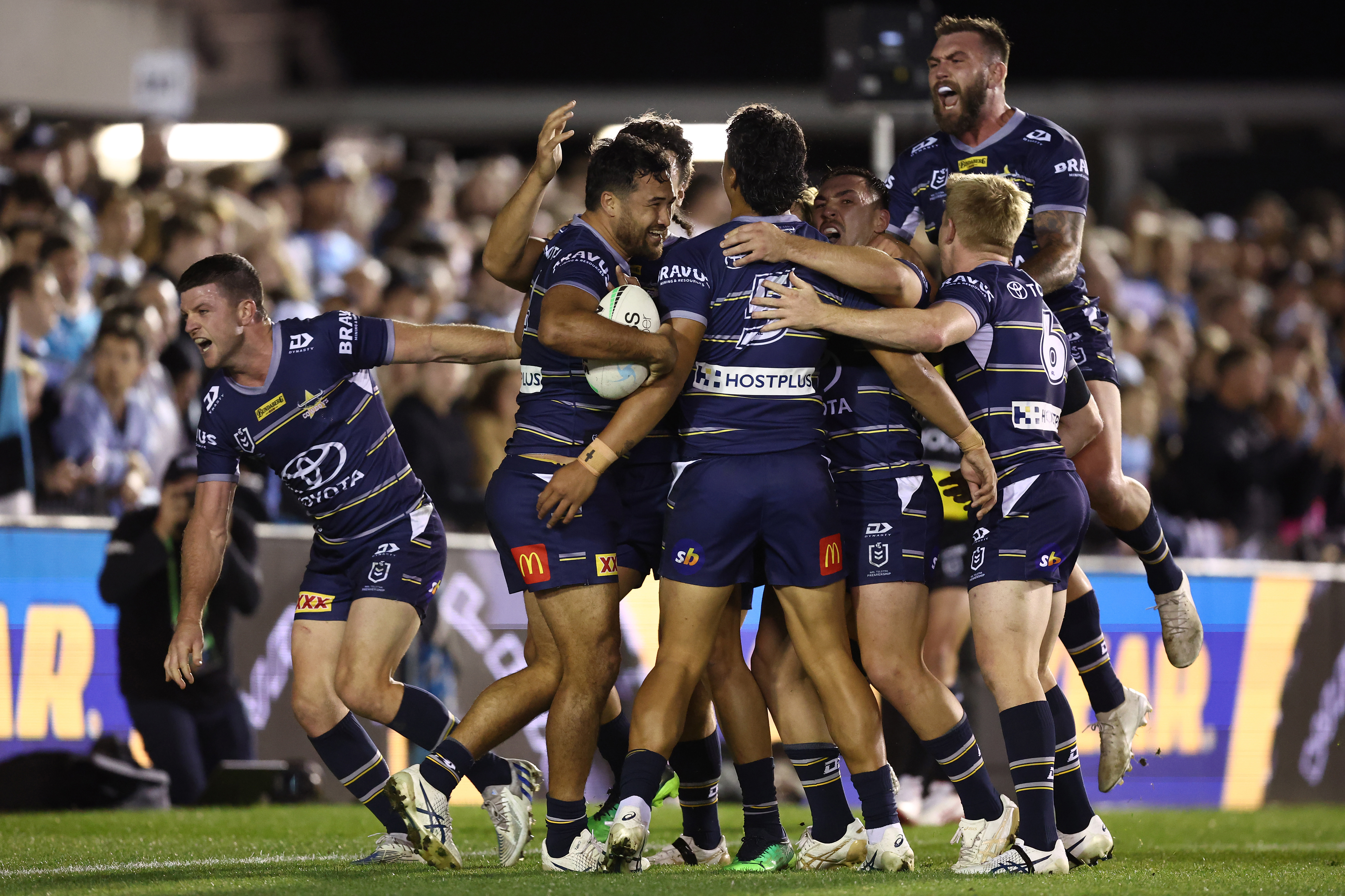 Peta Hiku of the Cowboys celebrates with team mates after scoring a try during the NRL Qualifying Final match between the Cronulla Sharks and the North Queensland Cowboys at PointsBet Stadium on September 10, 2022 in Sydney, Australia. (Photo by Mark Metcalfe/Getty Images)
