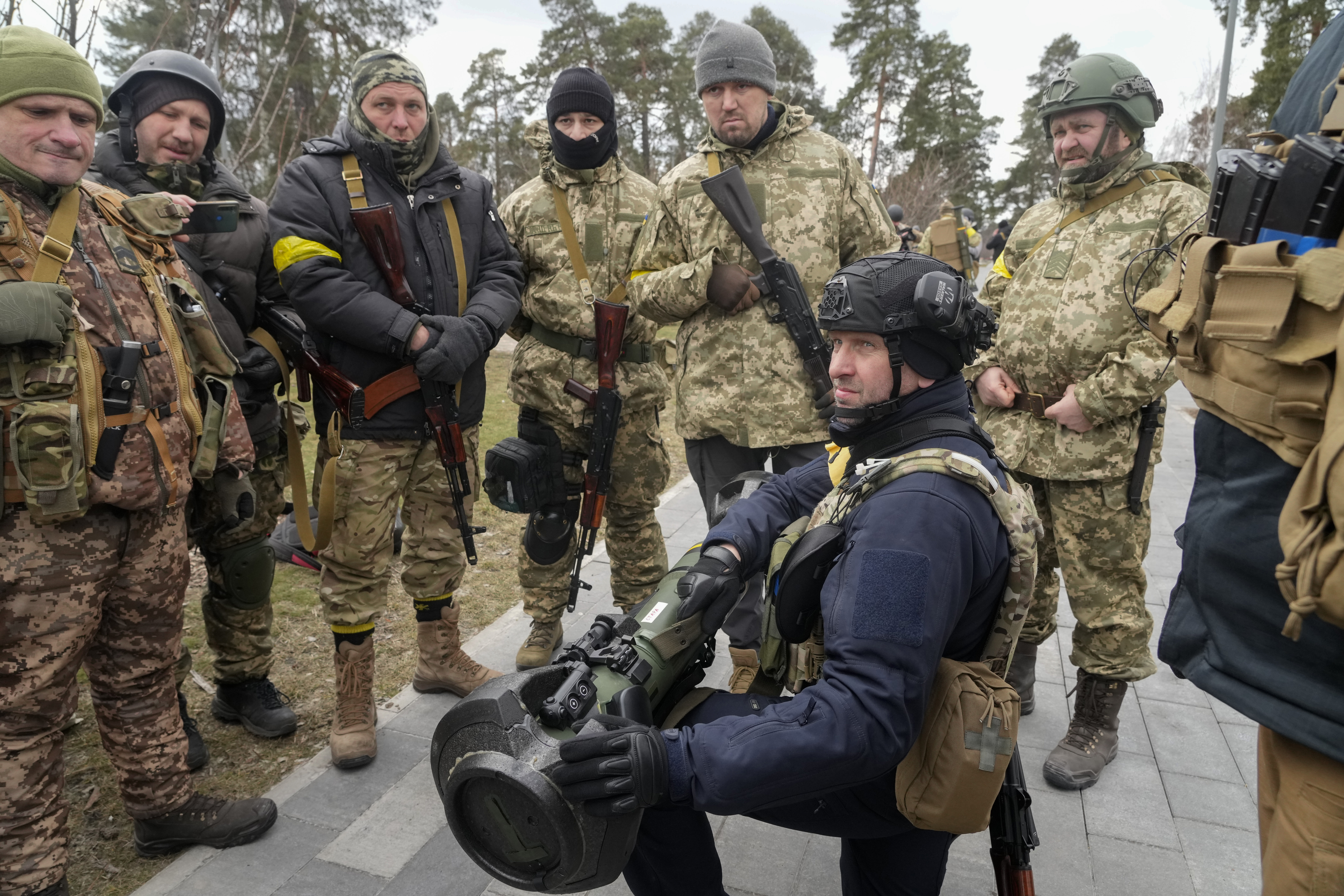 Ukrainian Territorial Defence Forces members train to use an NLAW anti-tank weapon in the city park in Kyiv outskirts, Ukraine, Wednesday, March 9, 2022 