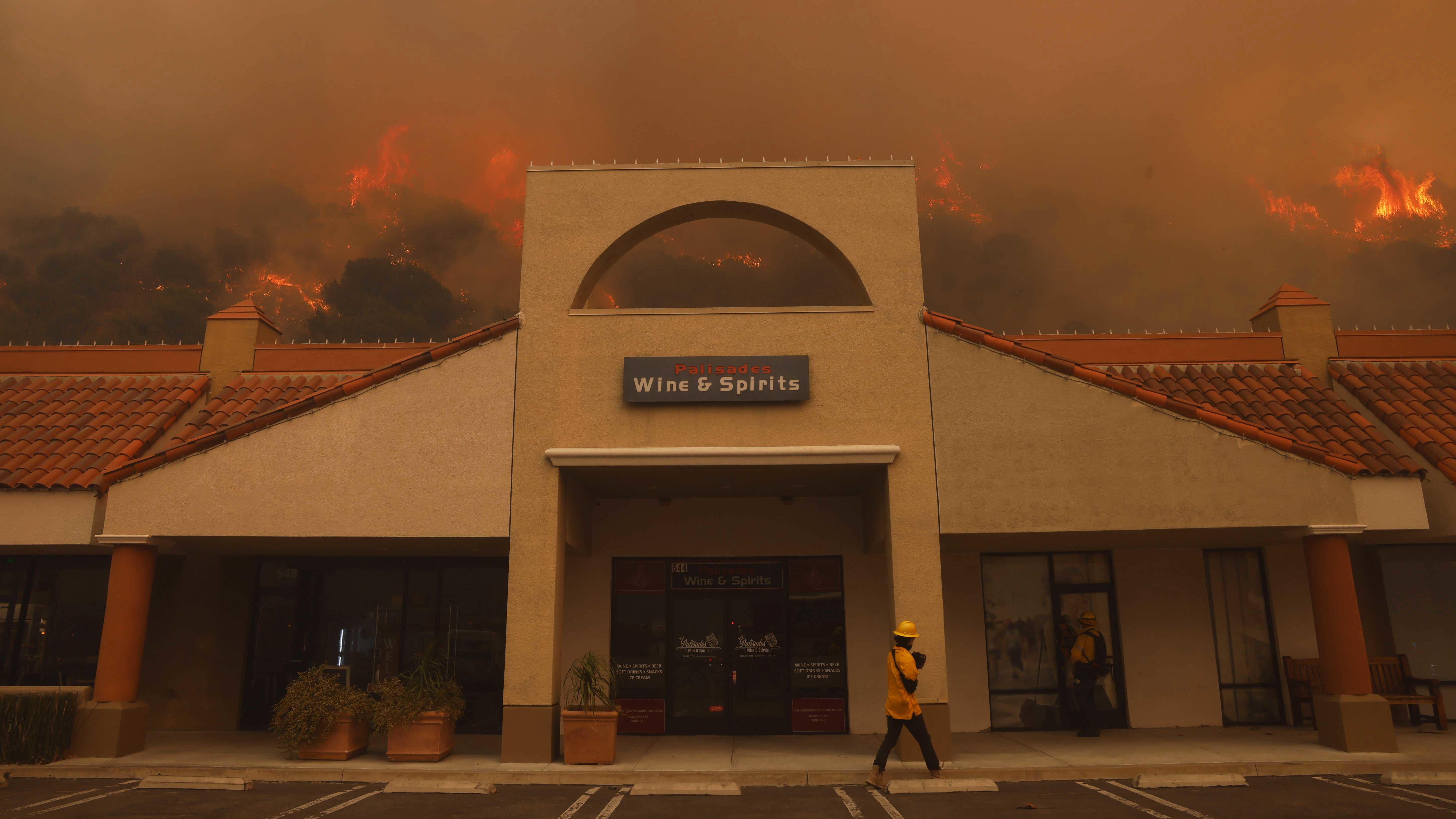 The Palisades Fire ignites behind a liquor store in the Pacific Palisades neighbourhood of Los Angeles.