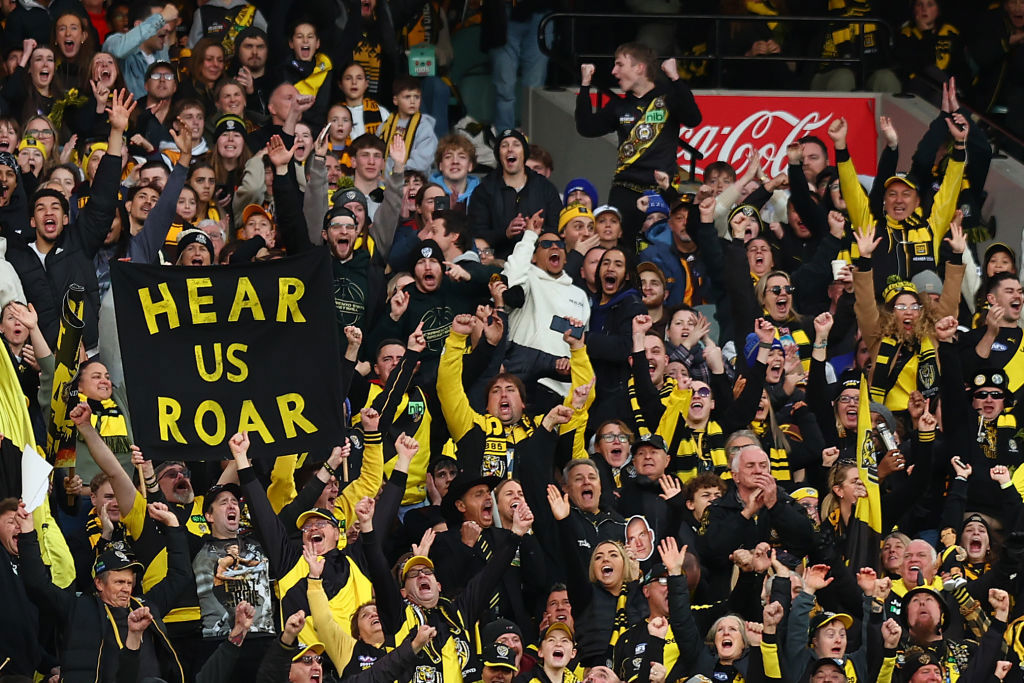 Dustin Martin 300th game; Fans erupt as Dustin Martin scores.