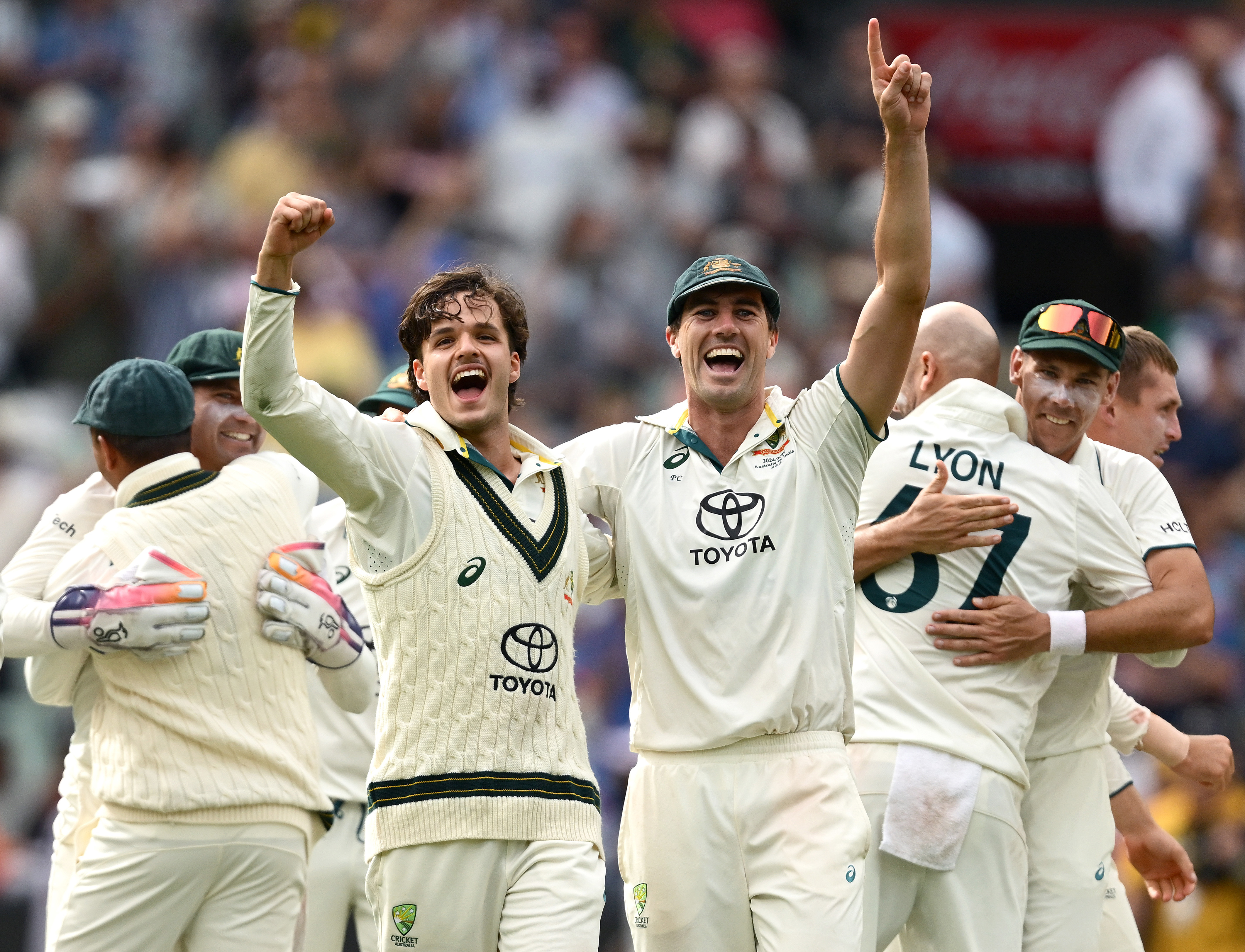 Sam Konstas and Pat Cummins celebrate at the MCG.