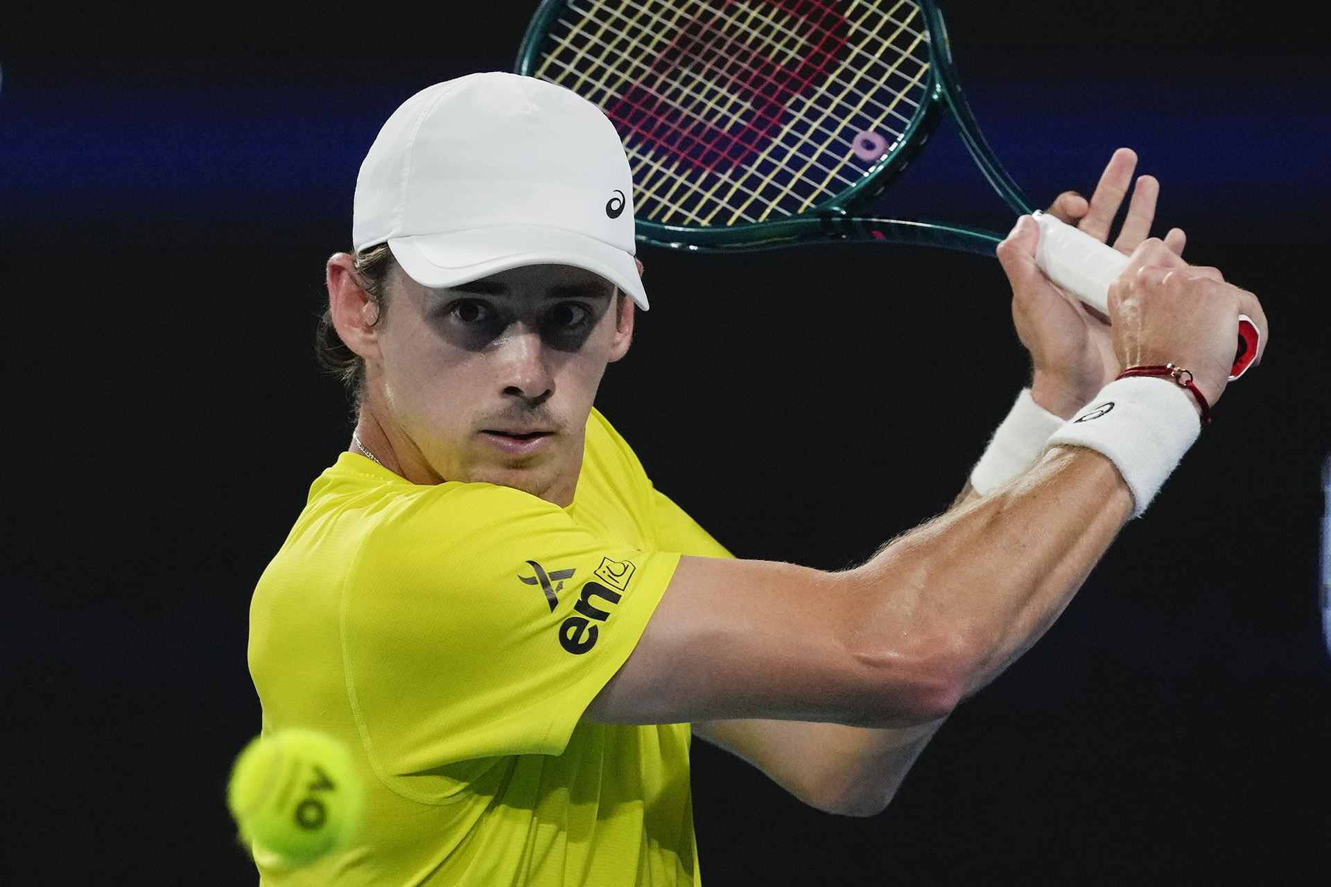 Australia's Alex de Minaur plays a backhand return to Germany's Alexander Zverev during their United Cup semifinal tennis match.