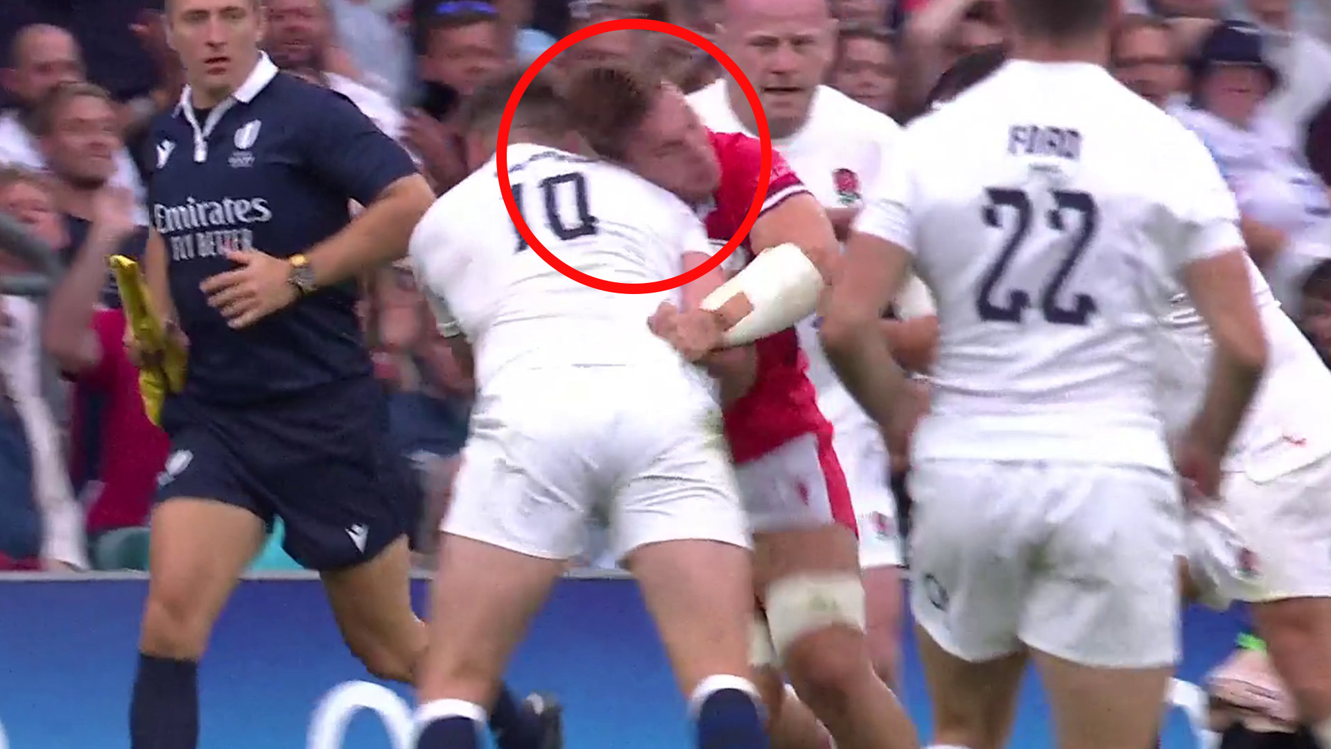 The shoulder of England captain Owen Farrell clatters into Wales flanker Taine Bashman's head.