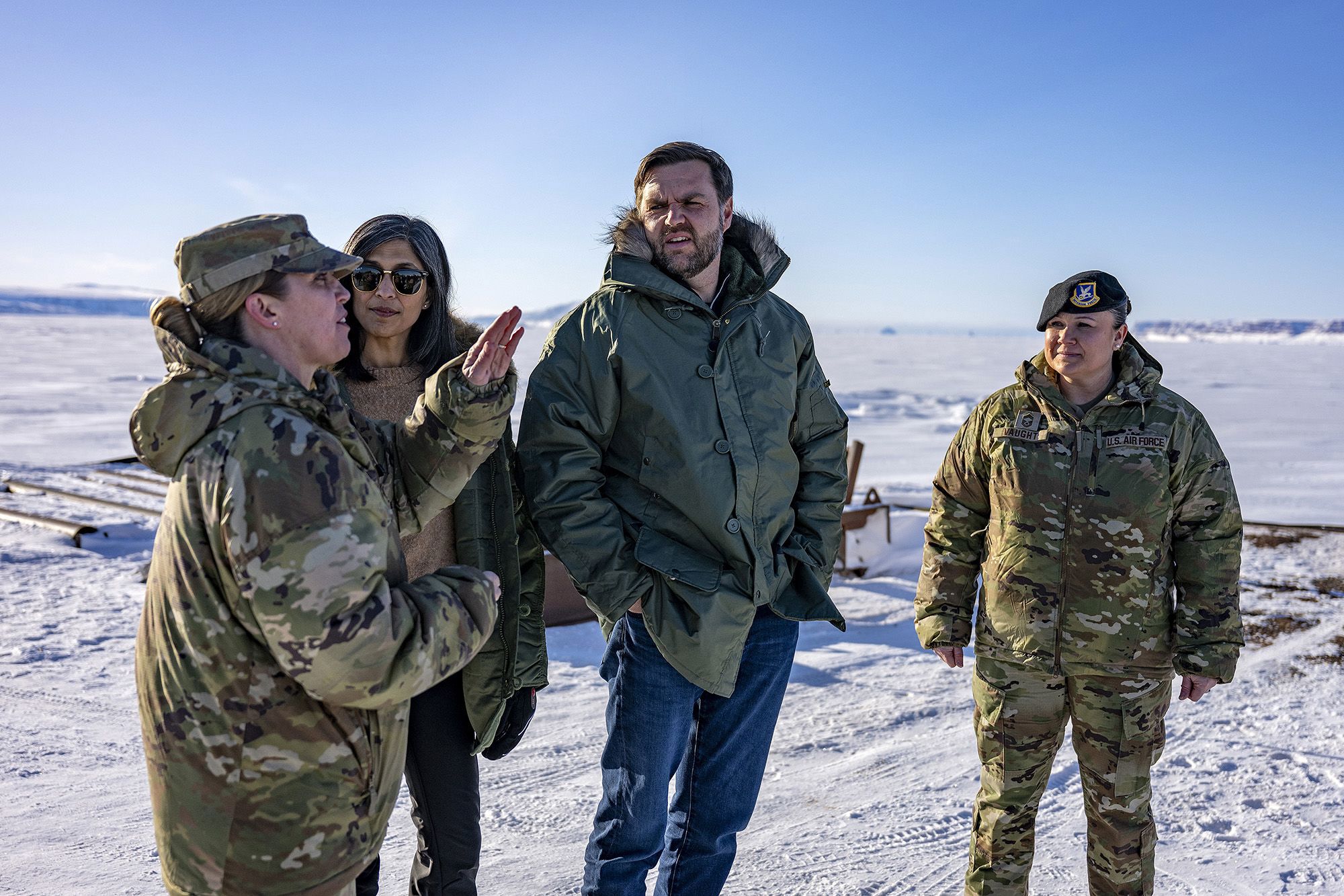 Vice President JD Vance and second lady Usha Vance stand with Col. Susan Meyers (L), commander of the US military's Pituffik Space Base, as they tour the base on March 28, 2025 in Pituffik, Greenland.