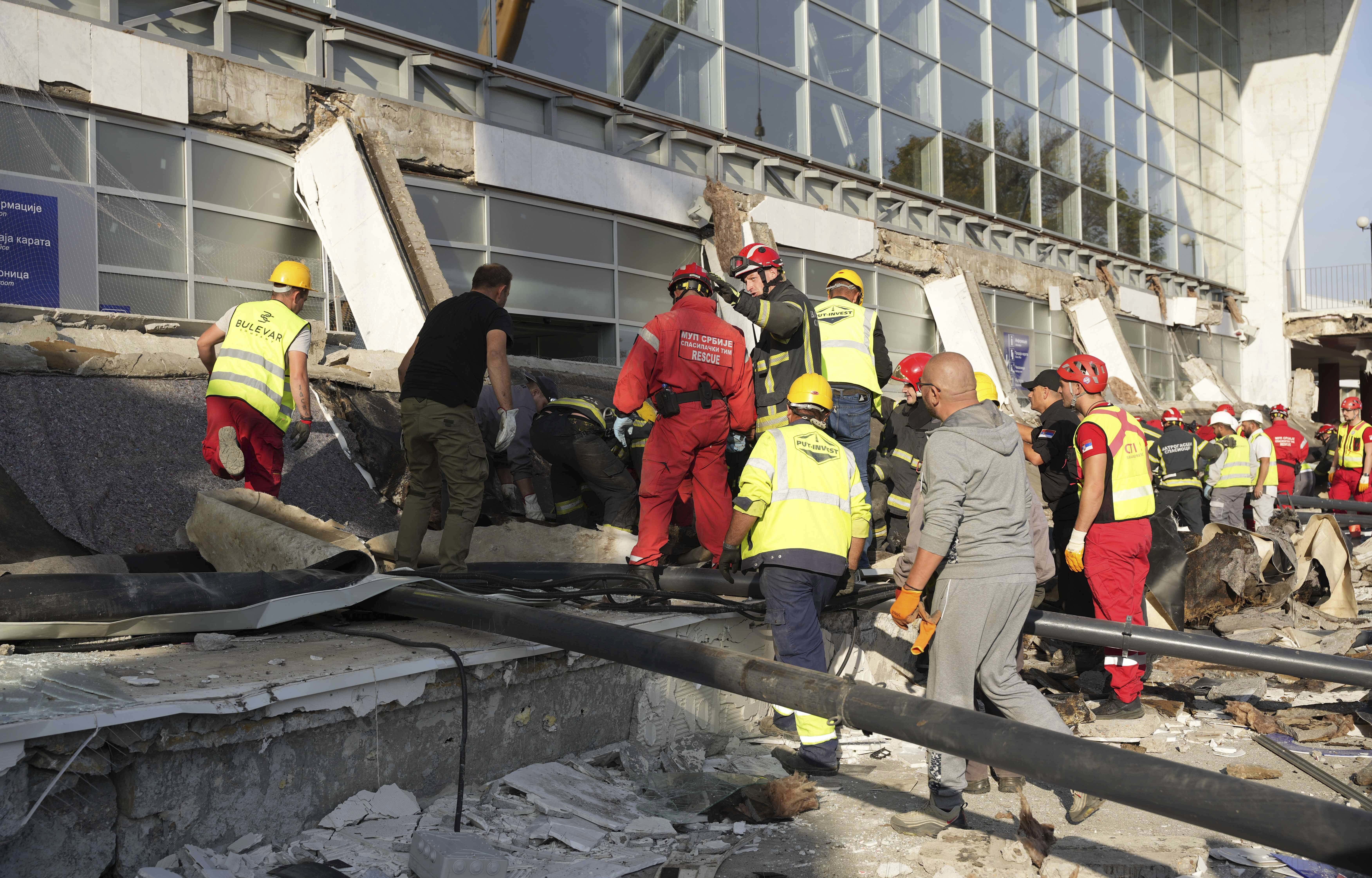 Rescue service workers inspect a scene as a roof collapsed at a railway station, Friday Nov. 1, 2024, in Novi Sad, Serbia. (Interior Ministry of Serbia via AP)