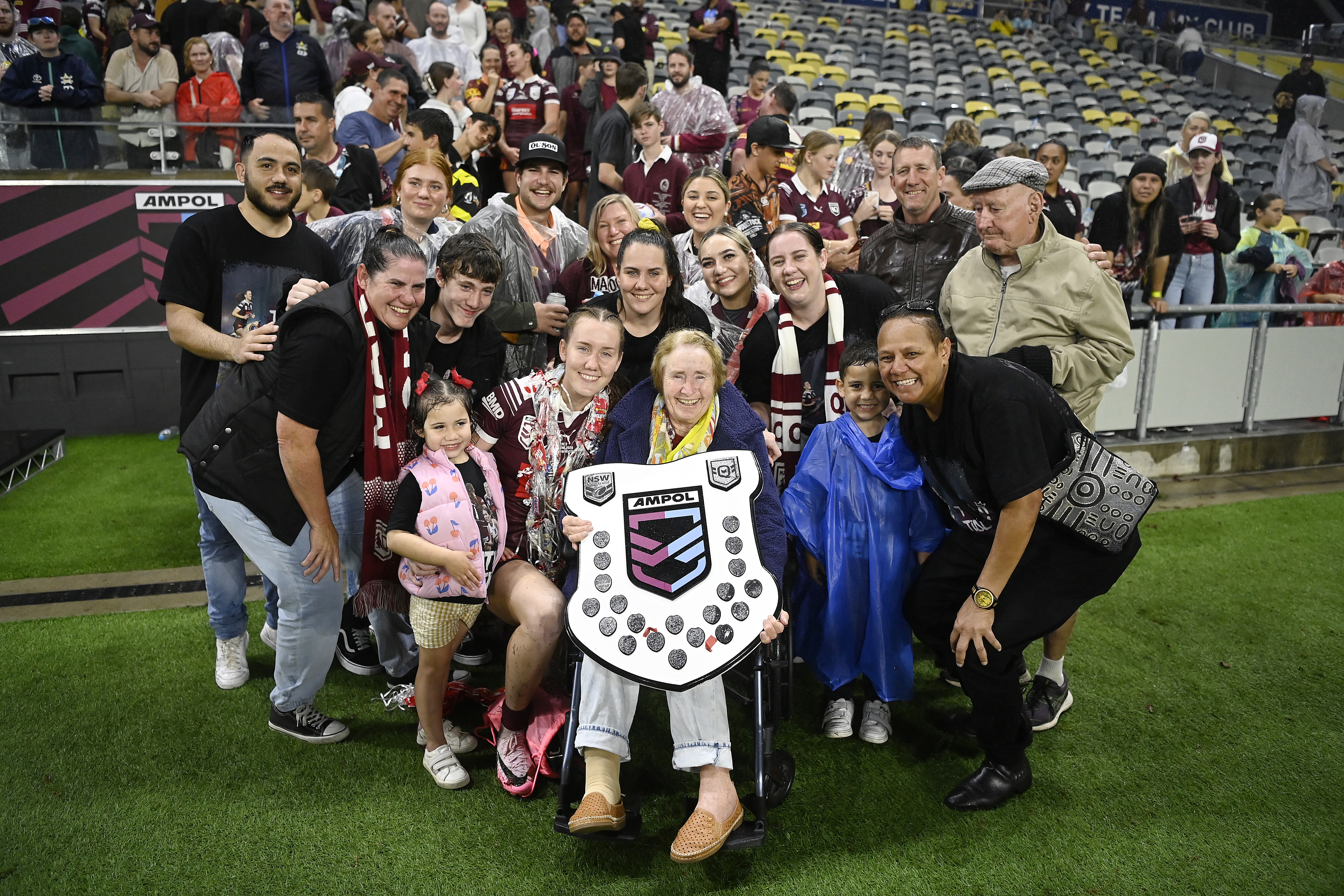 Tamika Upton of the Maroons celebrates with family and friends after winning Origin III and the 2024 Women's State of Origin series.