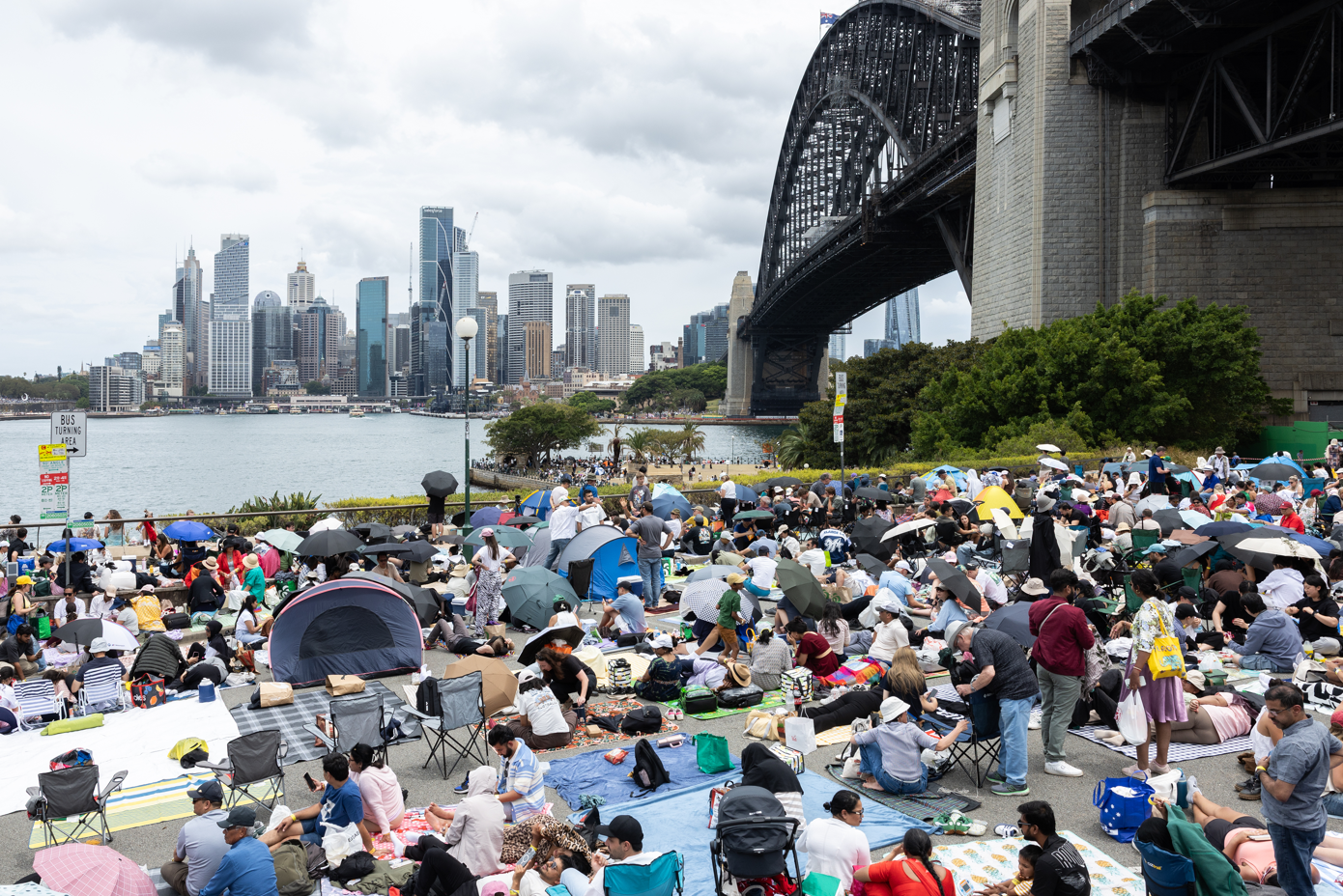 People at the Bradfield Park, Kirribilli free New Years Eve vantage point which is estimated to hold 16000 people for the fireworks. Wednesday 31st December 2025 AFR/SMH photo Louie Douvis