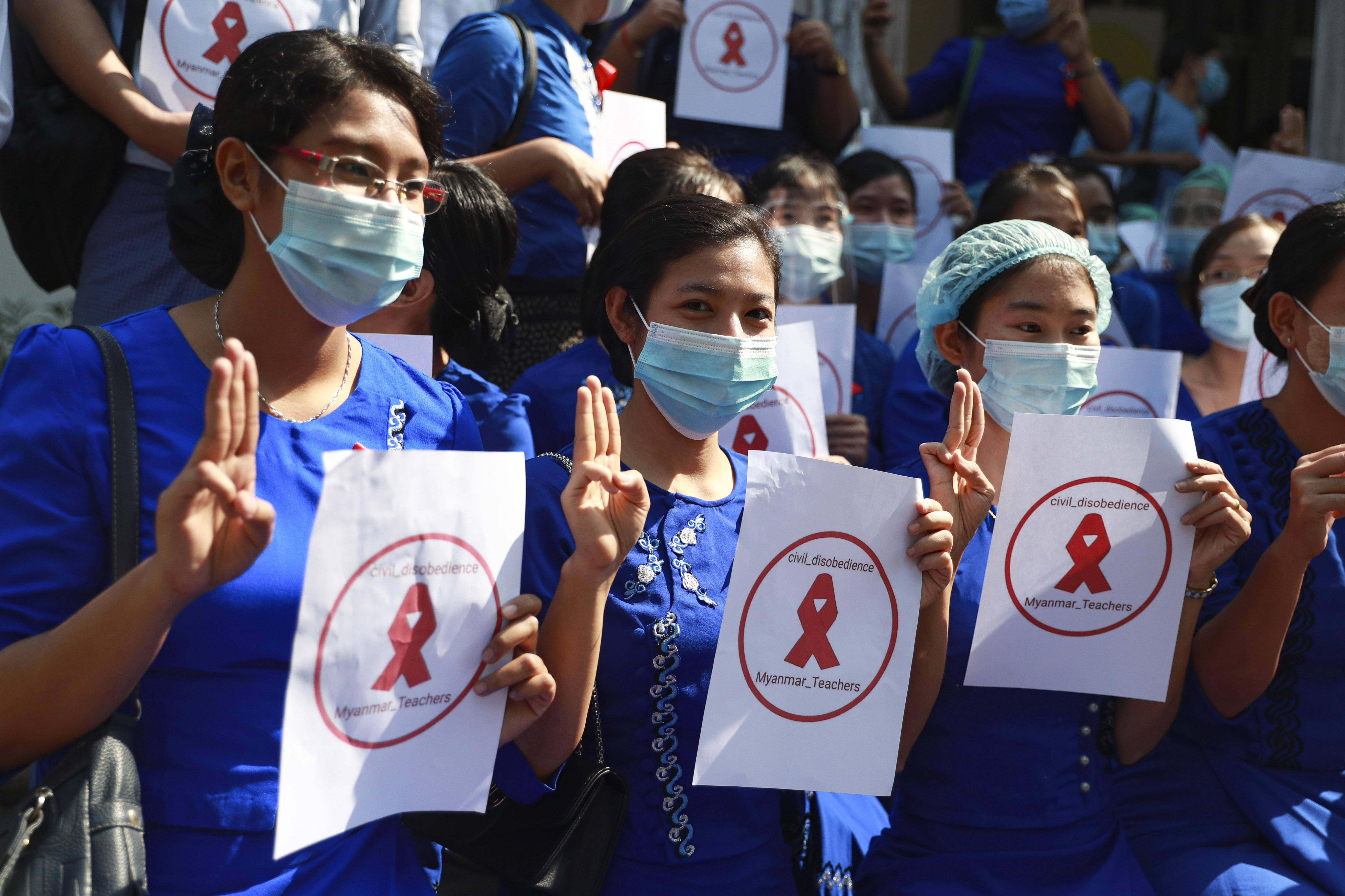 Hundreds Protest Myanmar Coup With Hunger Games Sign As Resistance Spreads