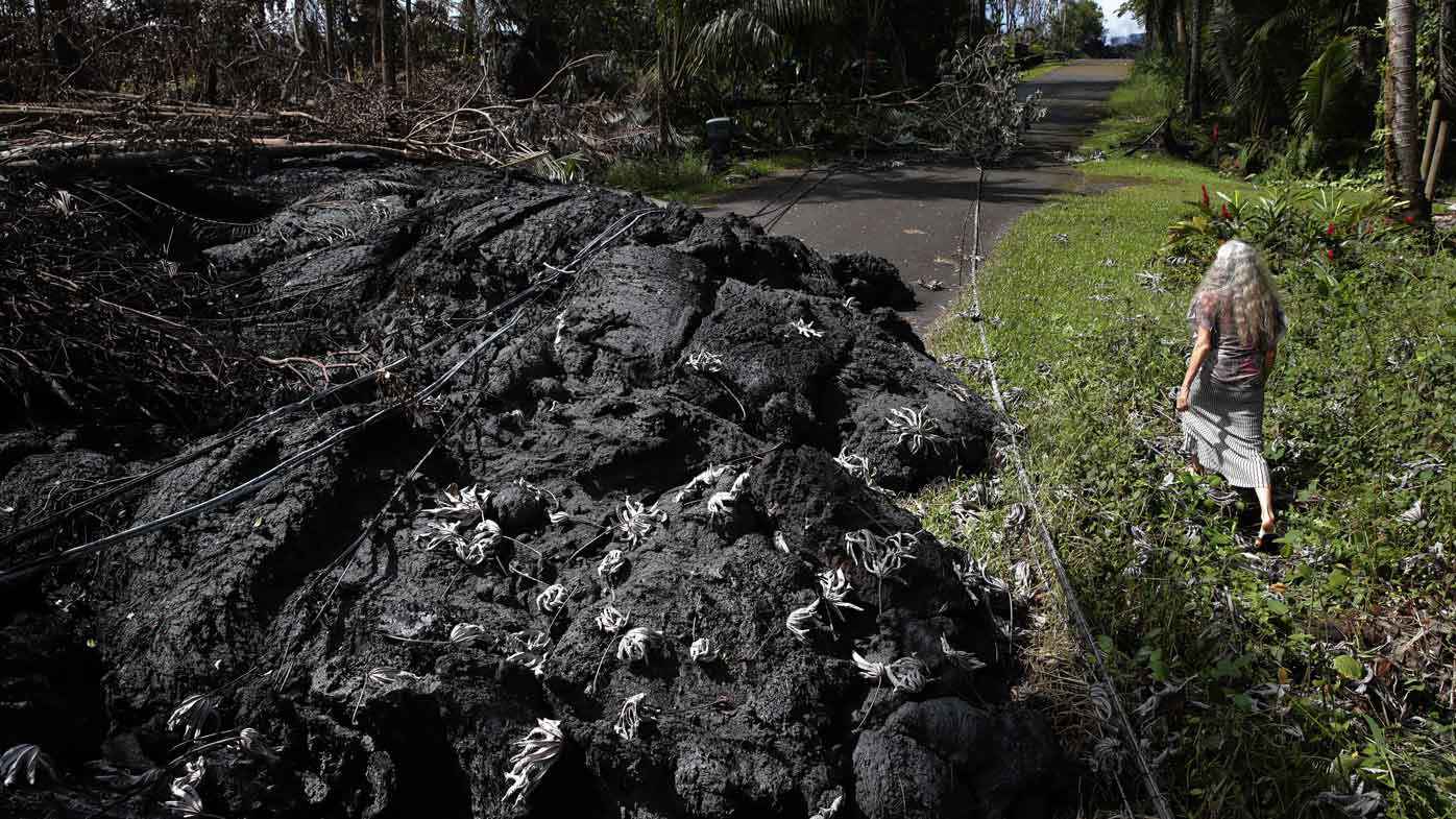 Hiking on cooled lava in Hawaii is a popular holiday pastime.