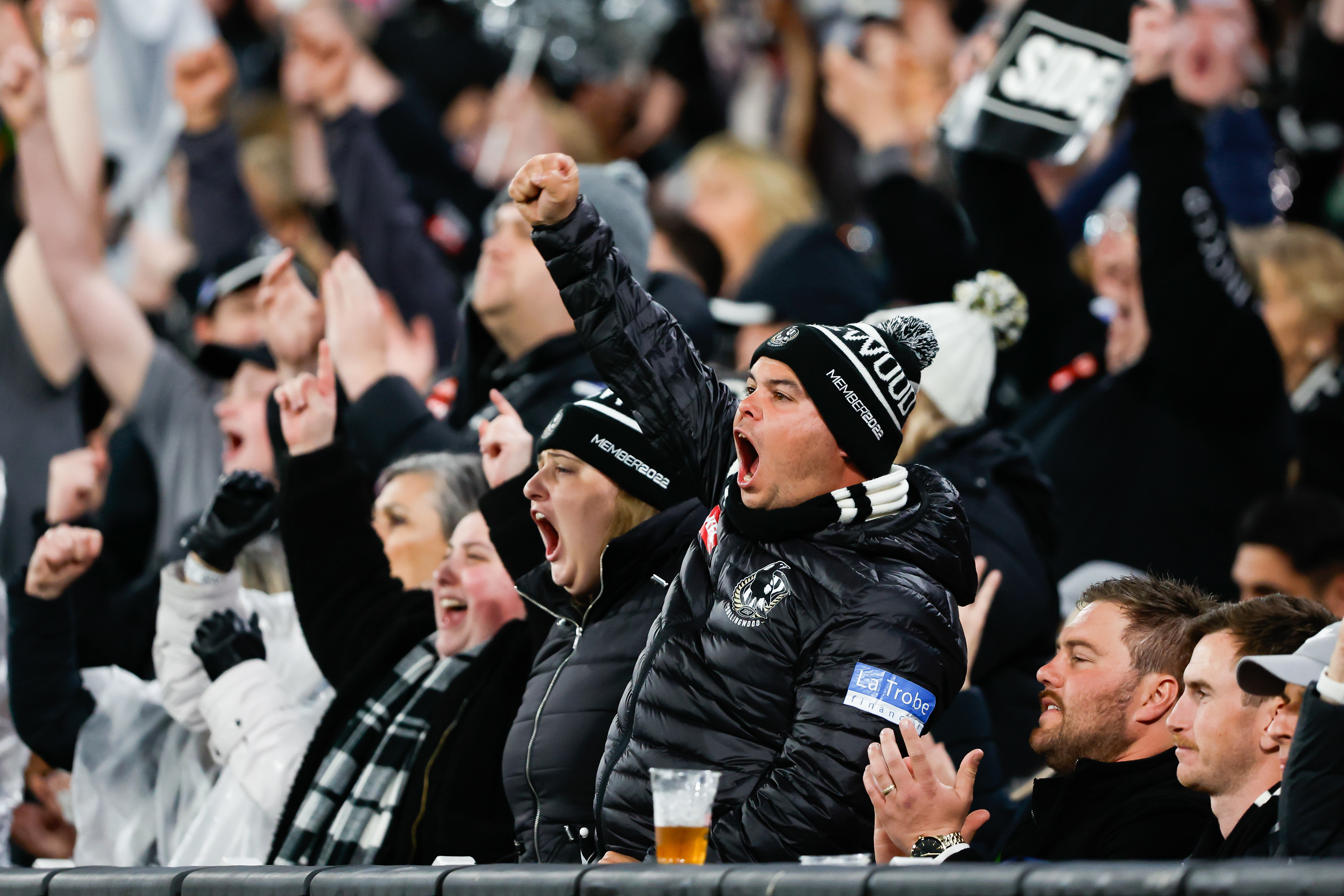 MELBOURNE, AUSTRALIA - SEPTEMBER 07: Collingwood fans celebrate during the 2023 AFL First Qualifying Final match between the Collingwood Magpies and the Melbourne Demons at Melbourne Cricket Ground on September 07, 2023 in Melbourne, Australia. (Photo by Dylan Burns/AFL Photos via Getty Images)