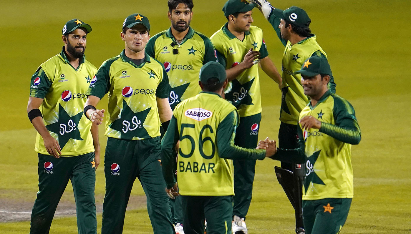 In this file photo, Pakistan players celebrate their win in the third Twenty20 cricket match against England at Old Trafford in Manchester, England. Six members of the Pakistan cricket squad in New Zealand have tested positive to COVID-19.