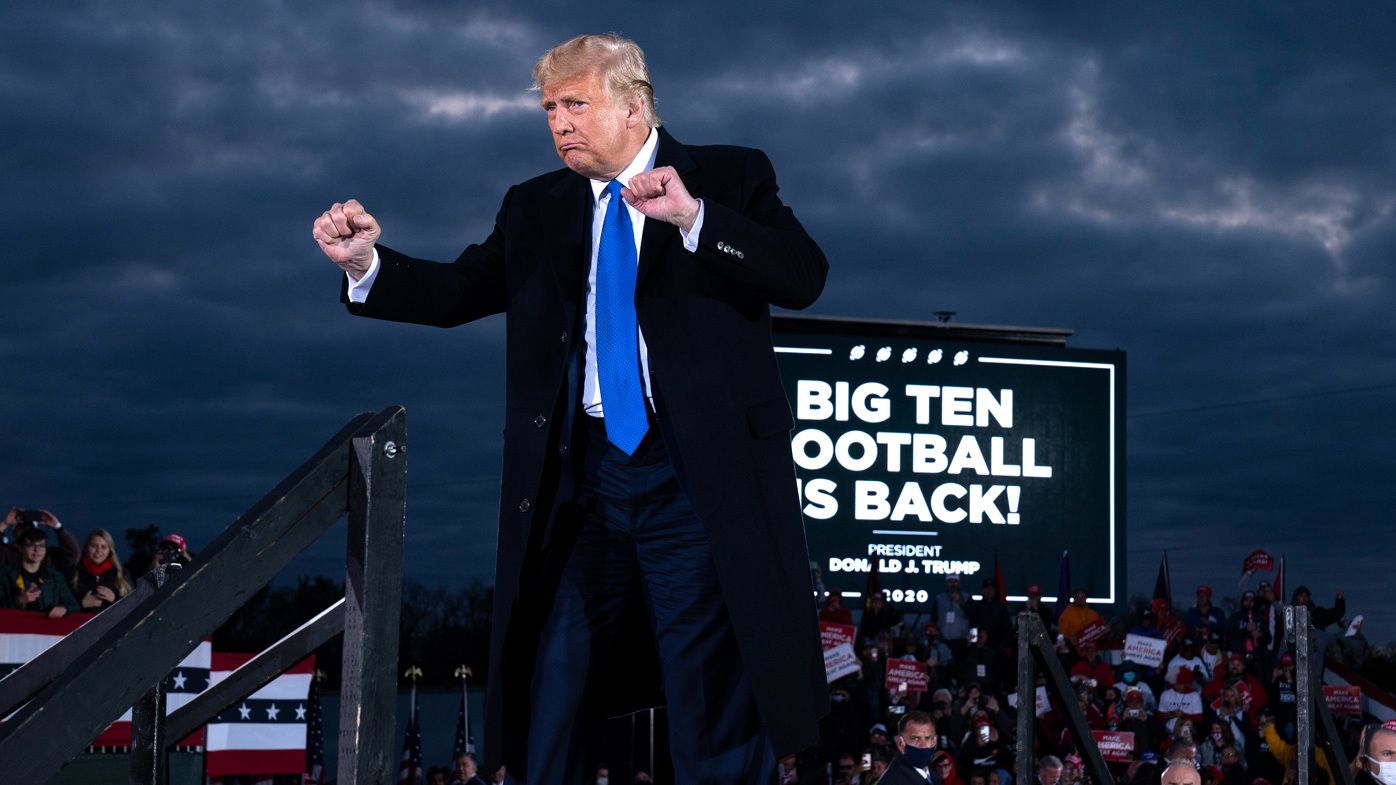 President Donald Trump dances after speaking during a campaign rally in Circleville, Ohio.