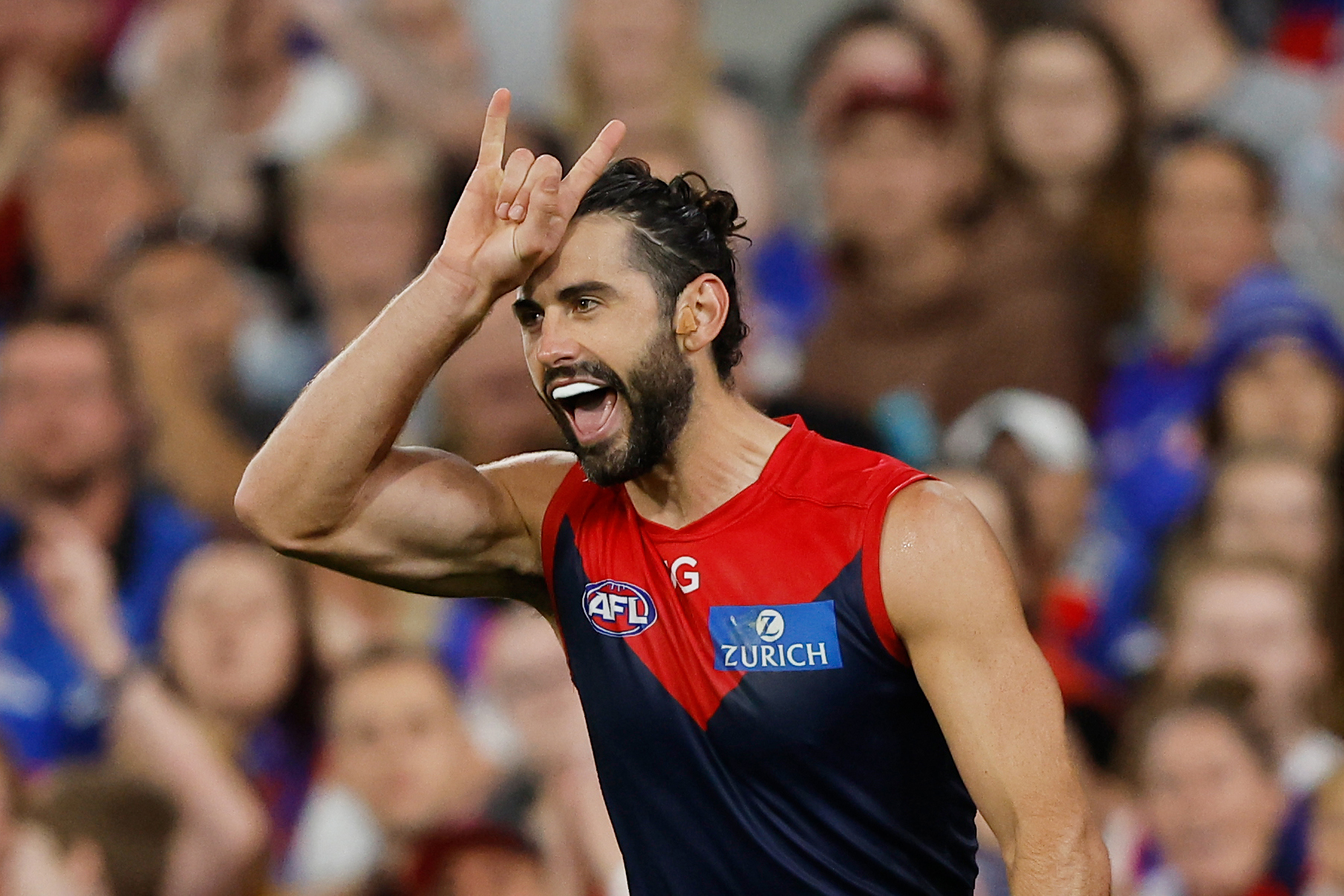 MELBOURNE, AUSTRALIA - MARCH 18: Brodie Grundy of the Demons celebrates a goal during the 2023 AFL Round 01 match between the Melbourne Demons and the Western Bulldogs at the Melbourne Cricket Ground on March 18, 2023 In Melbourne, Australia. (Photo by Dylan Burns/AFL Photos)