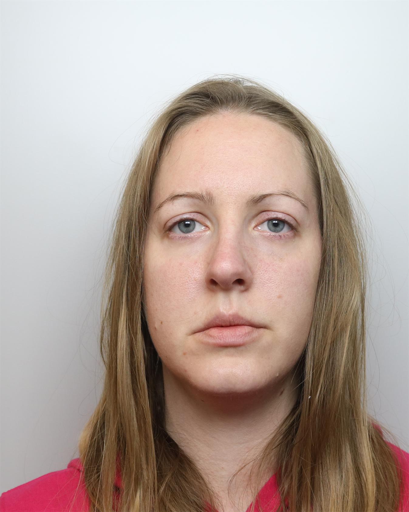 In this handout photo provided by Cheshire Constabulary, Lucy Letby has a headshot taken while in police custody in November 2020 