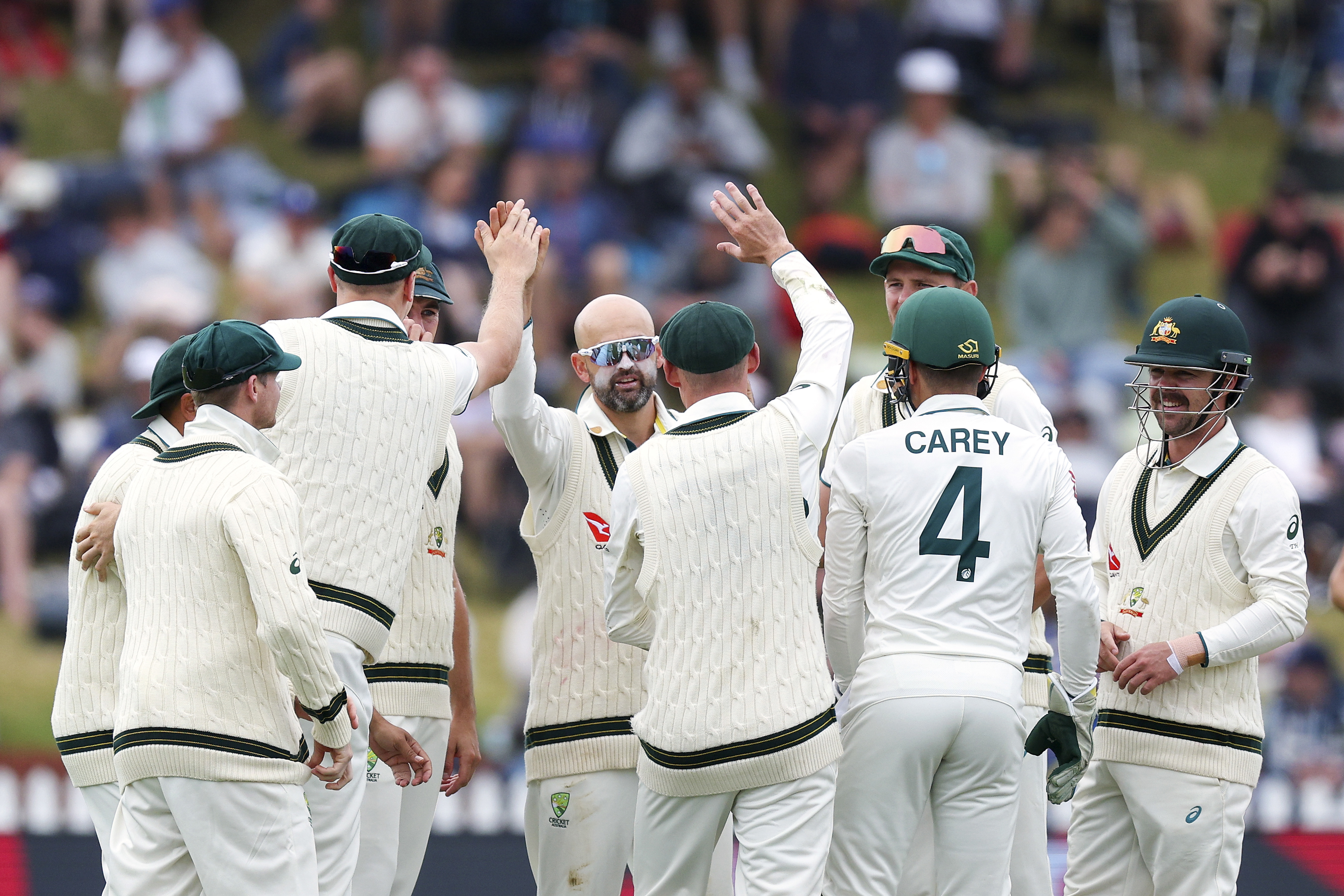 Nathan Lyon of Australia celebrates after taking the wicket of Glenn Phillips of New Zealand for a five wicket bag during day four of the First Test in the series between New Zealand and Australia at Basin Reserve on March 03, 2024 in Wellington, New Zealand. (Photo by Hagen Hopkins/Getty Images)