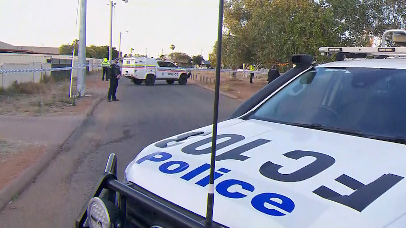 Police stand watch as a forensic search of the house in Carnarvon where Cleo Smith was found is conducted.