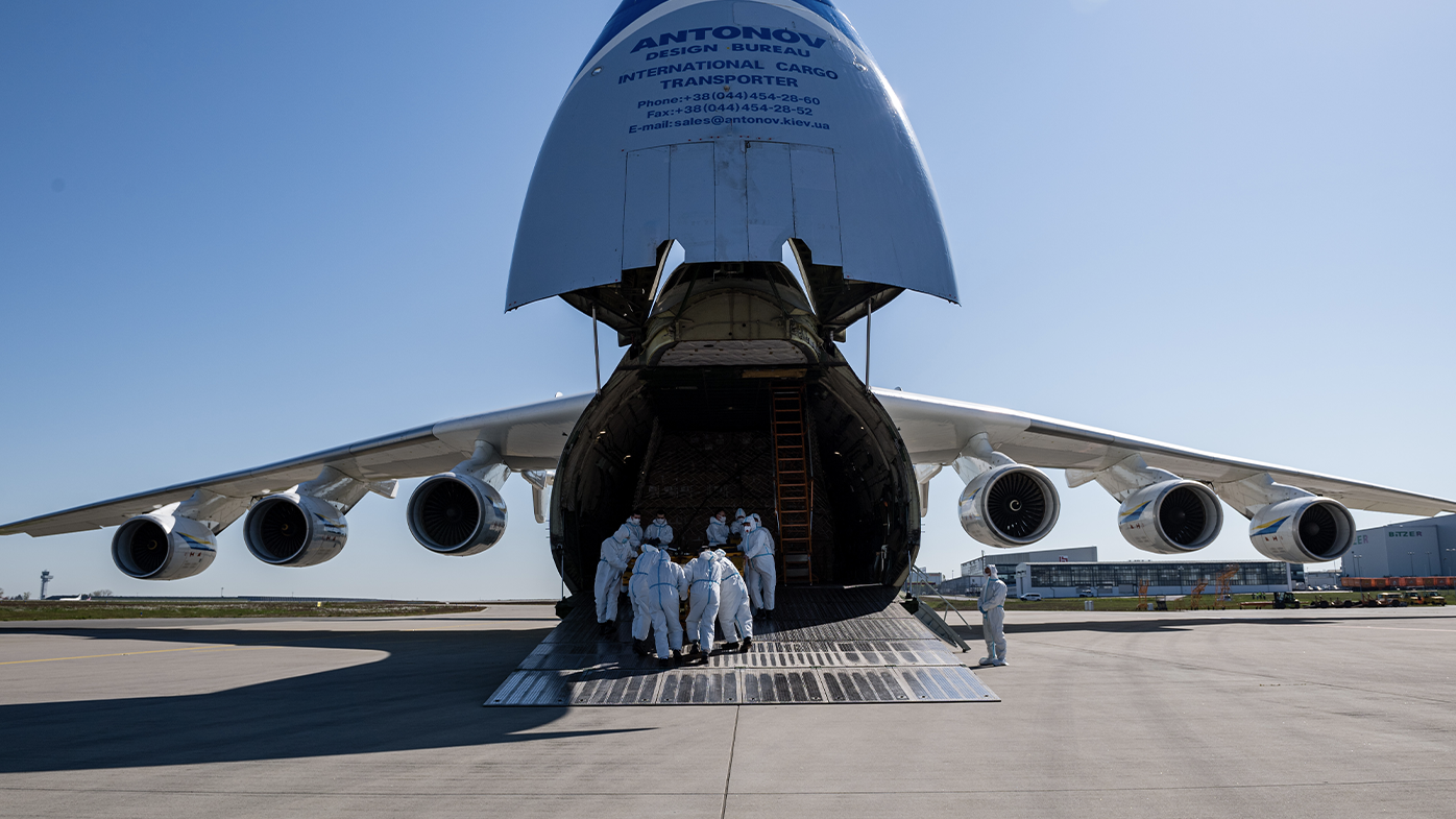 Workers unload a shipment of 10 million protective face masks and other protective medical gear that had arrived on an Antonov 225 cargo plane from China at Leipzig/Halle Airport during the novel coronavirus crisis on April 27, 2020 in Schkeuditz, Germany.