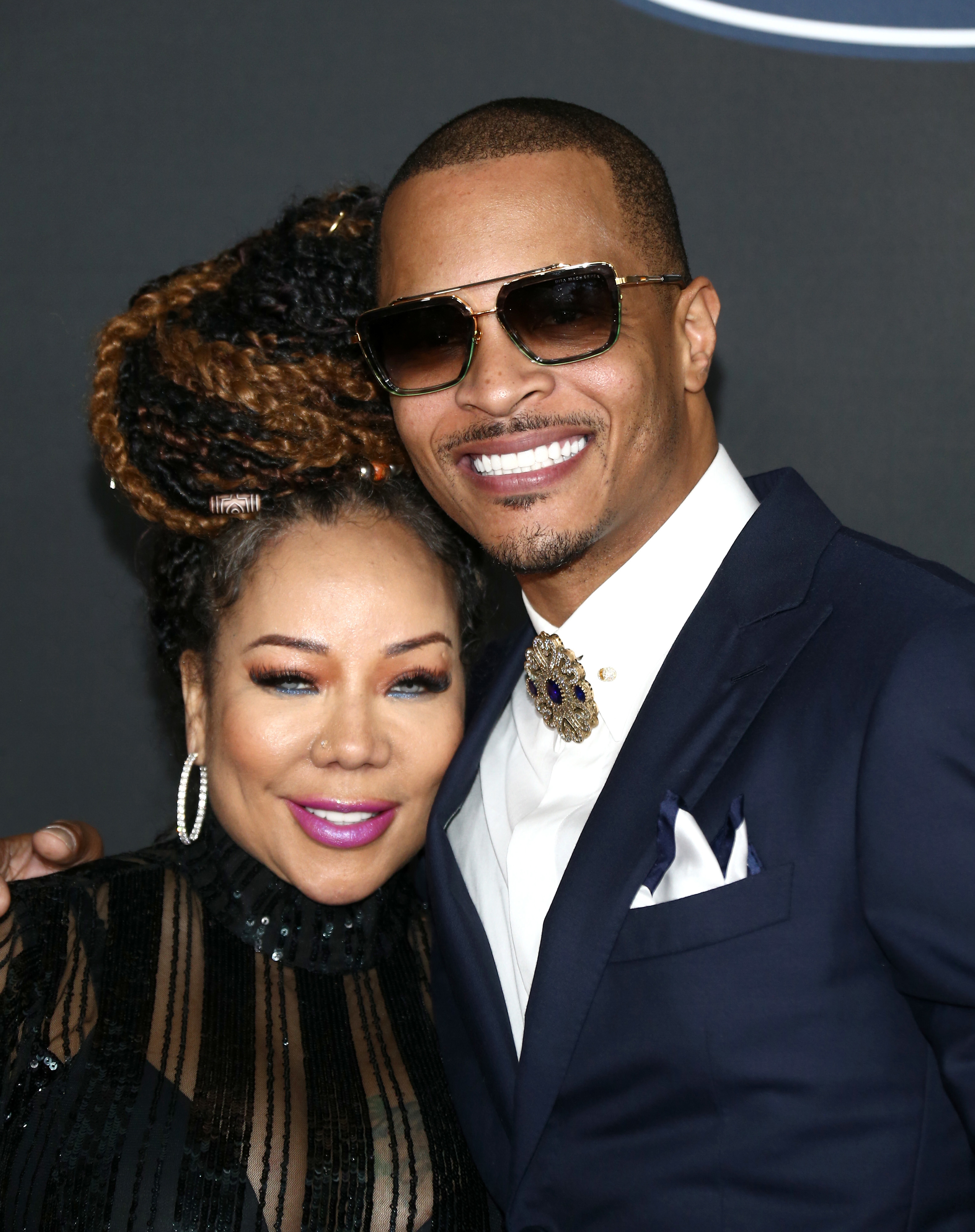 Tameka Harris and T.I. attend the 51st NAACP Image Awards, Presented by BET, at Pasadena Civic Auditorium on February 22, 2020 in Pasadena, California. 