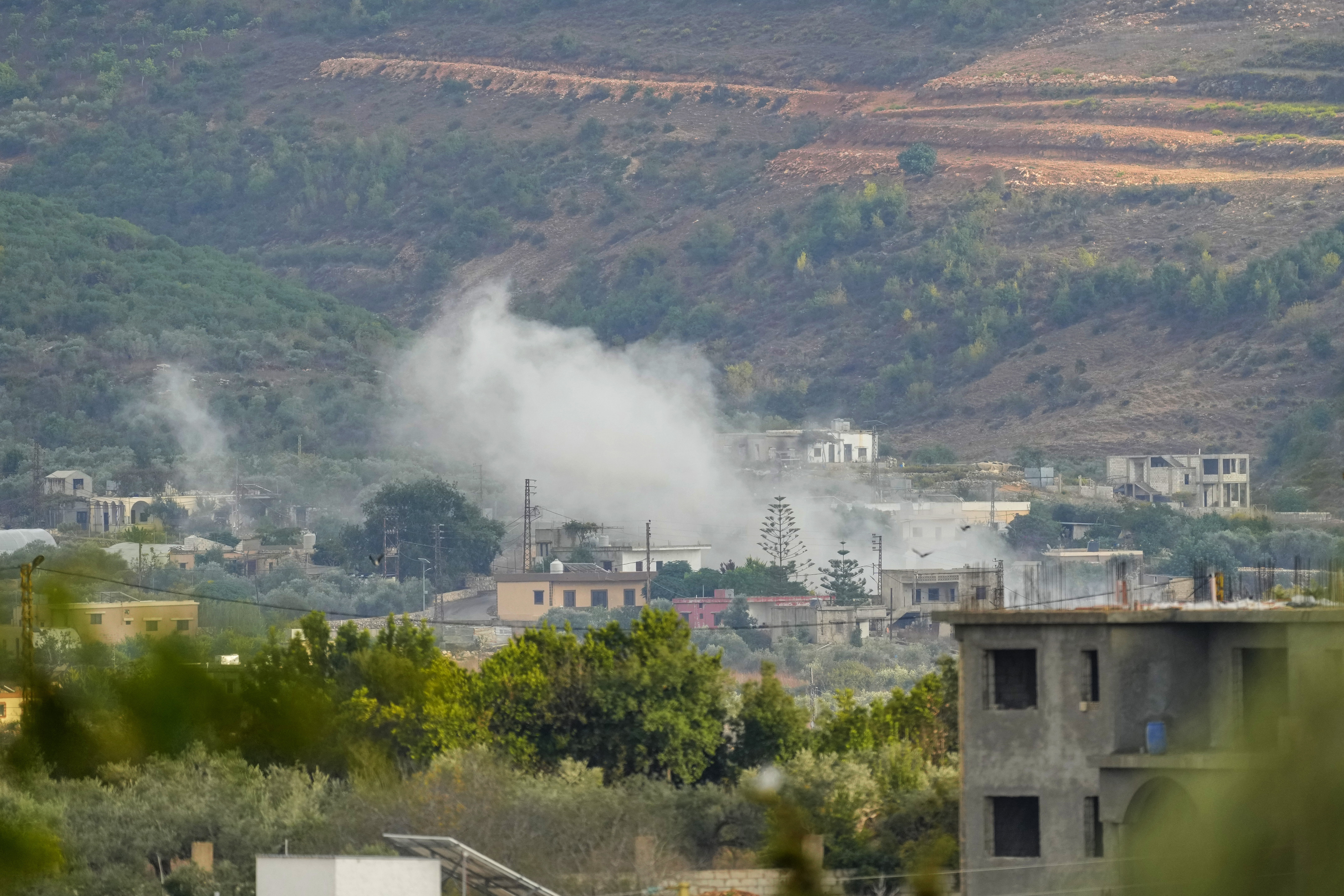 Smoke rises after a shelling in Um el-Tot, a Lebanese border village with Israel, south Lebanon, Thursday, Oct. 19, 2023. 