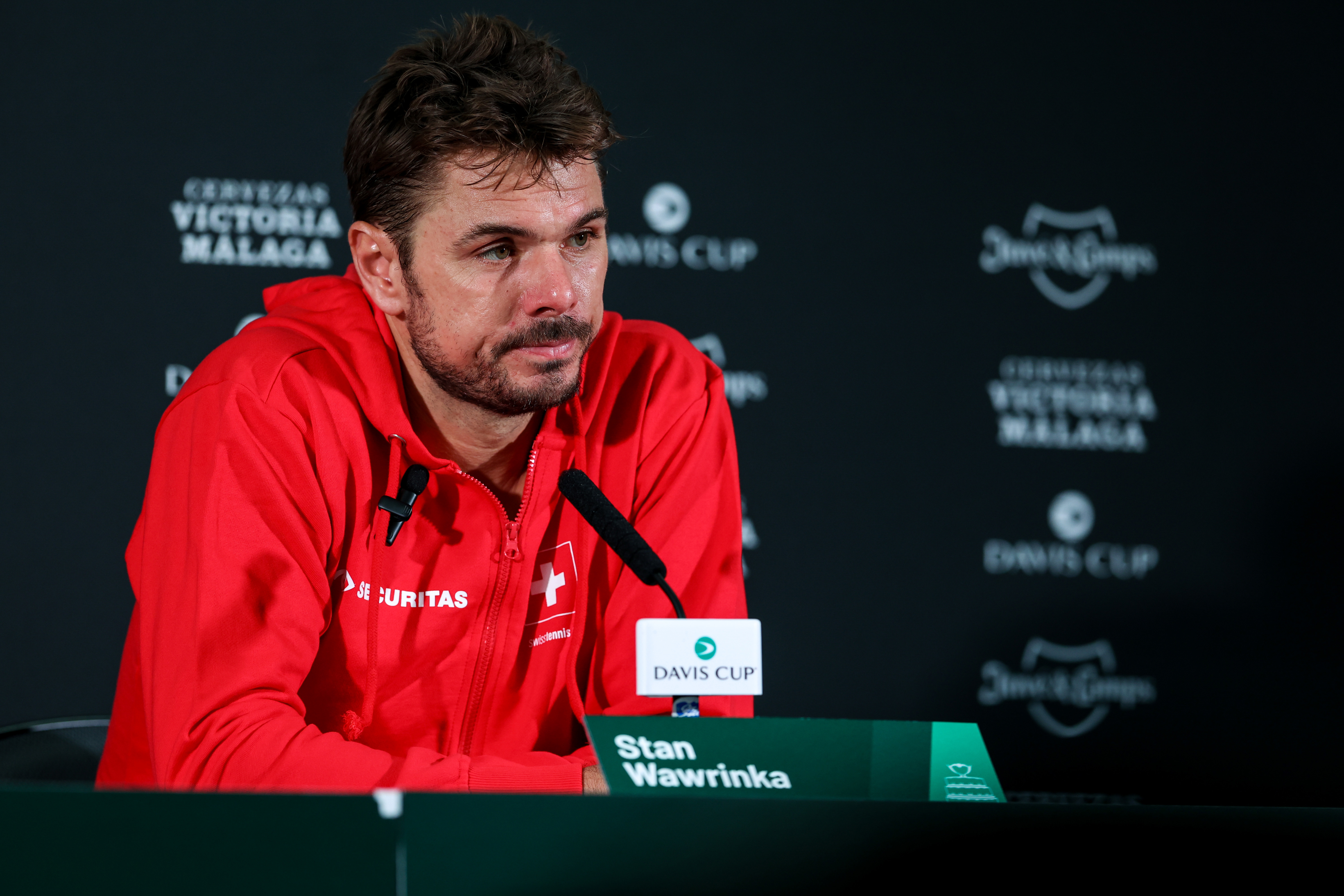 Stan Wawrinka of team Switzerland speaks to the media after his doubles match at the Davis Cup.