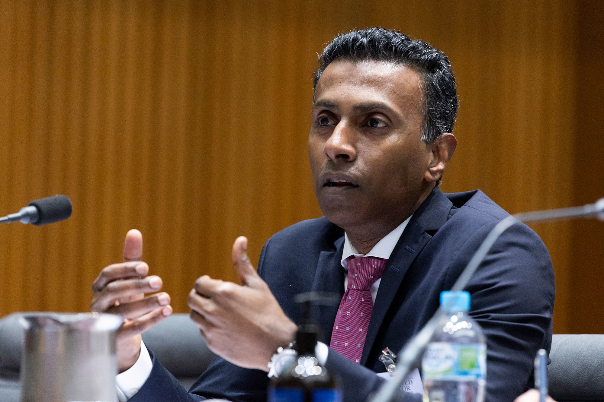 Lambo Kanagaratnam, Optus, Managing Director, Networks, during a Senate hearing at Parliament House