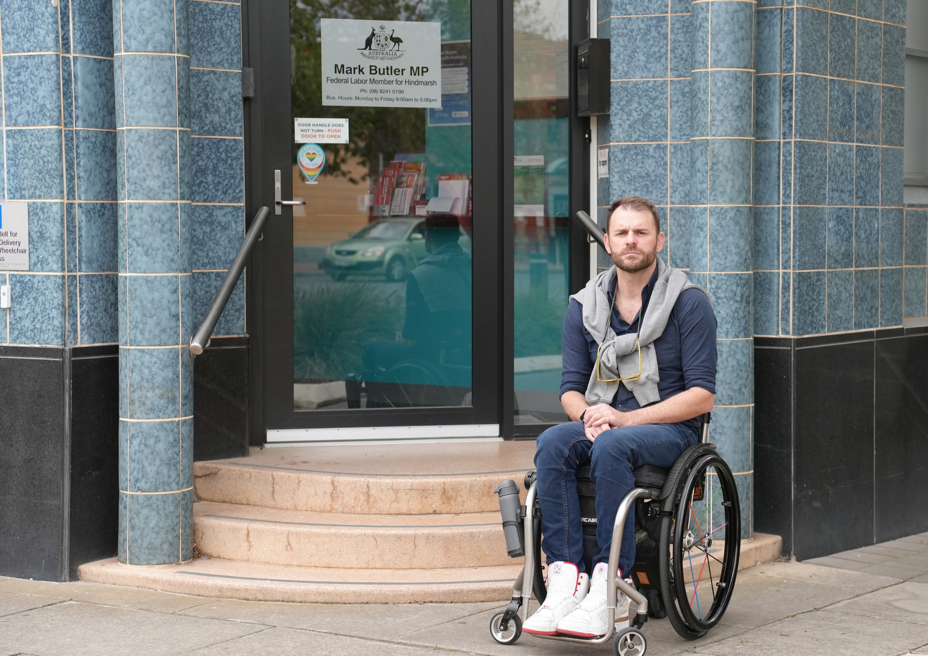 Shane Hryhorec has been using a wheelchair for the past 18 years and ran into an ironic and glaring issue at Health and Disability Minister Mark Butler's office in Port Adelaide.