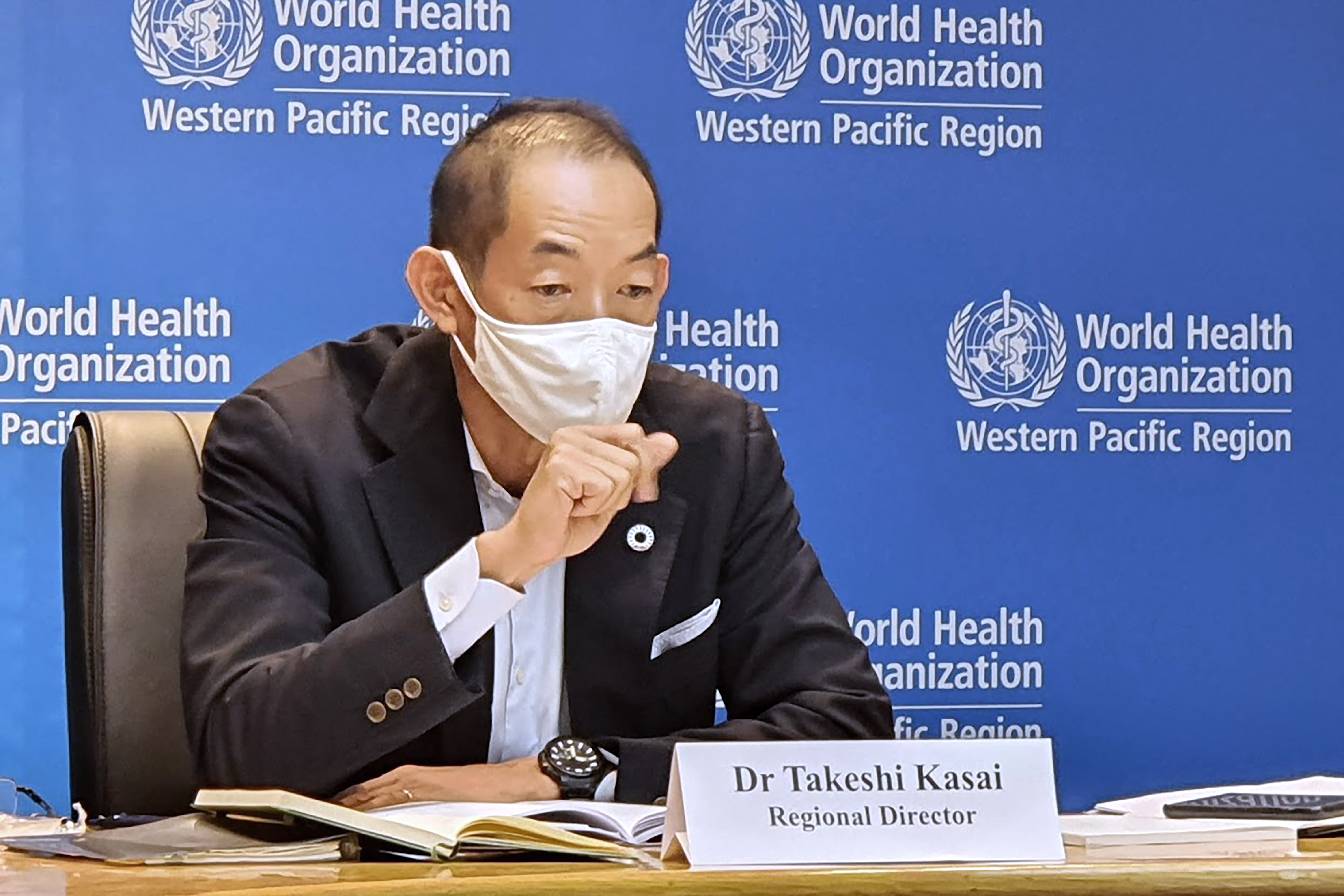WHO Regional Director for the Western Pacific Dr. Takeshi Kasai, speaks in Manila, Philippines on Thursday Nov. 11, 2021.