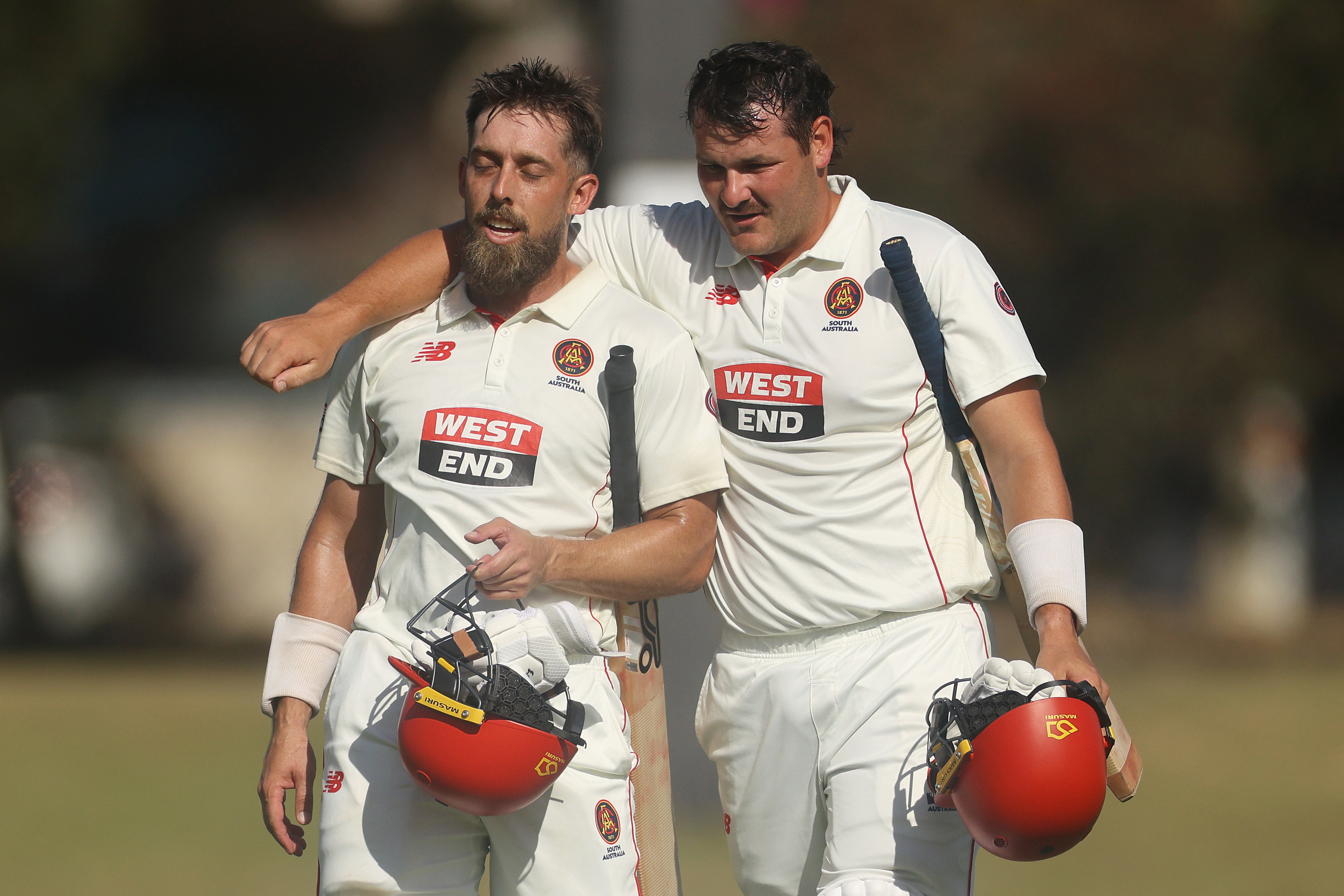 MELBOURNE, AUSTRALIA - MARCH 09: Jake Lehmann of South Australia and Ben Manenti of South Australia embrace after winning the Sheffield Shield match between Victoria and South Australia at CitiPower Centre, on March 09, 2025, in Melbourne, Australia. (Photo by Daniel Pockett/Getty Images)