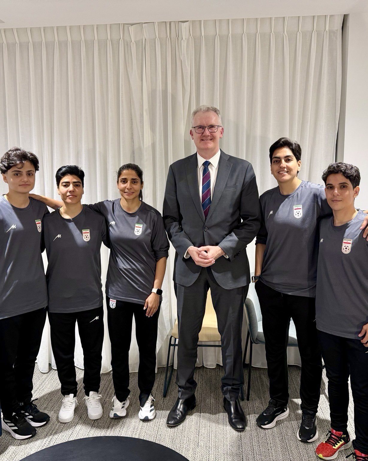 Home Affairs Minister Tony Burke posted images with the footballers on his twitter after they were granted asylum.